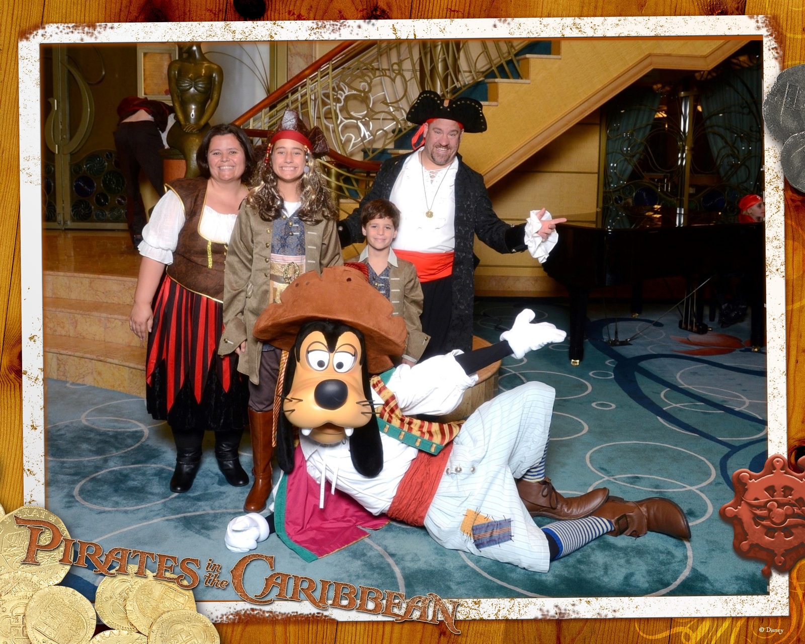 Kathy, the kids and me with pirate Goofy