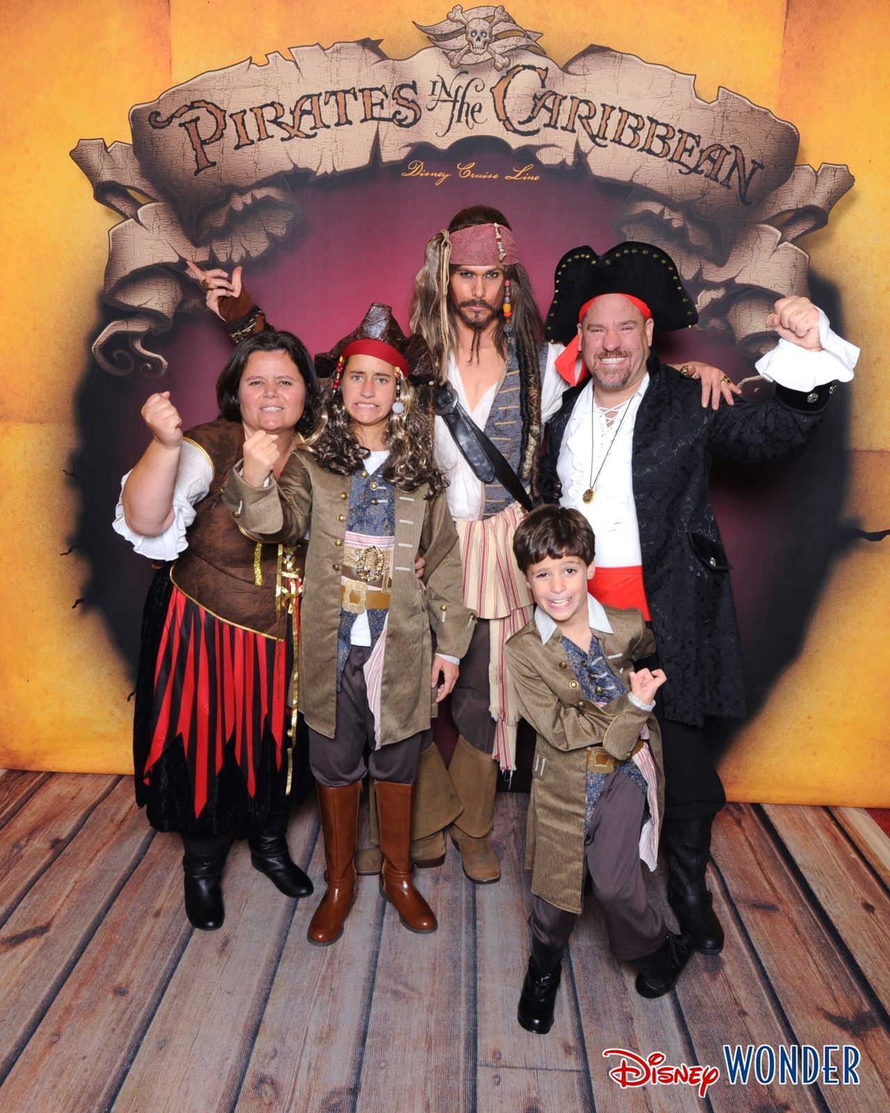 Kathy, Lisa, Captain Jack Sparrow, Thomas & Michael in pirate costumes on Pirate Night