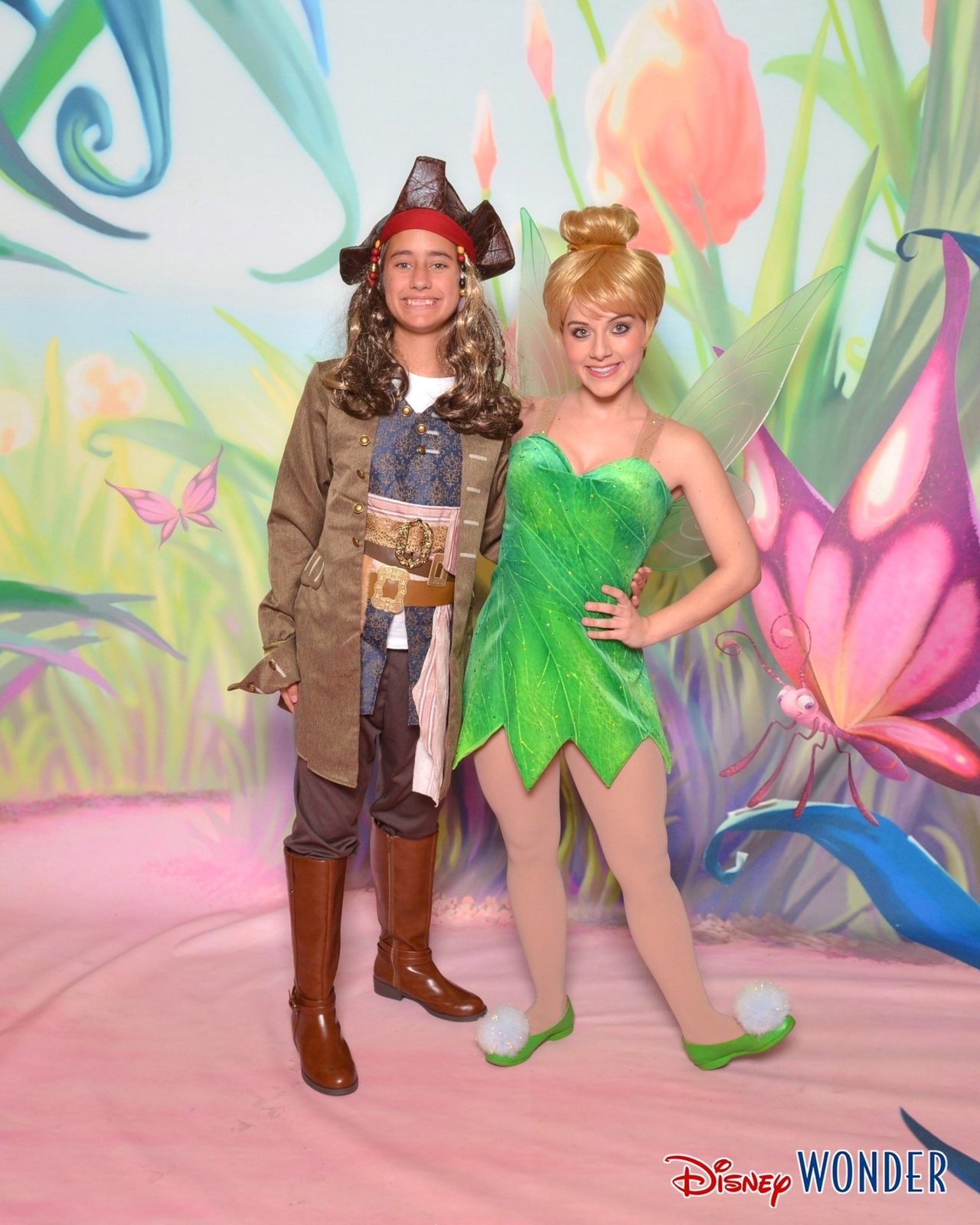 Lisa in her pirate costume with Tinker Bell on Pirate Night