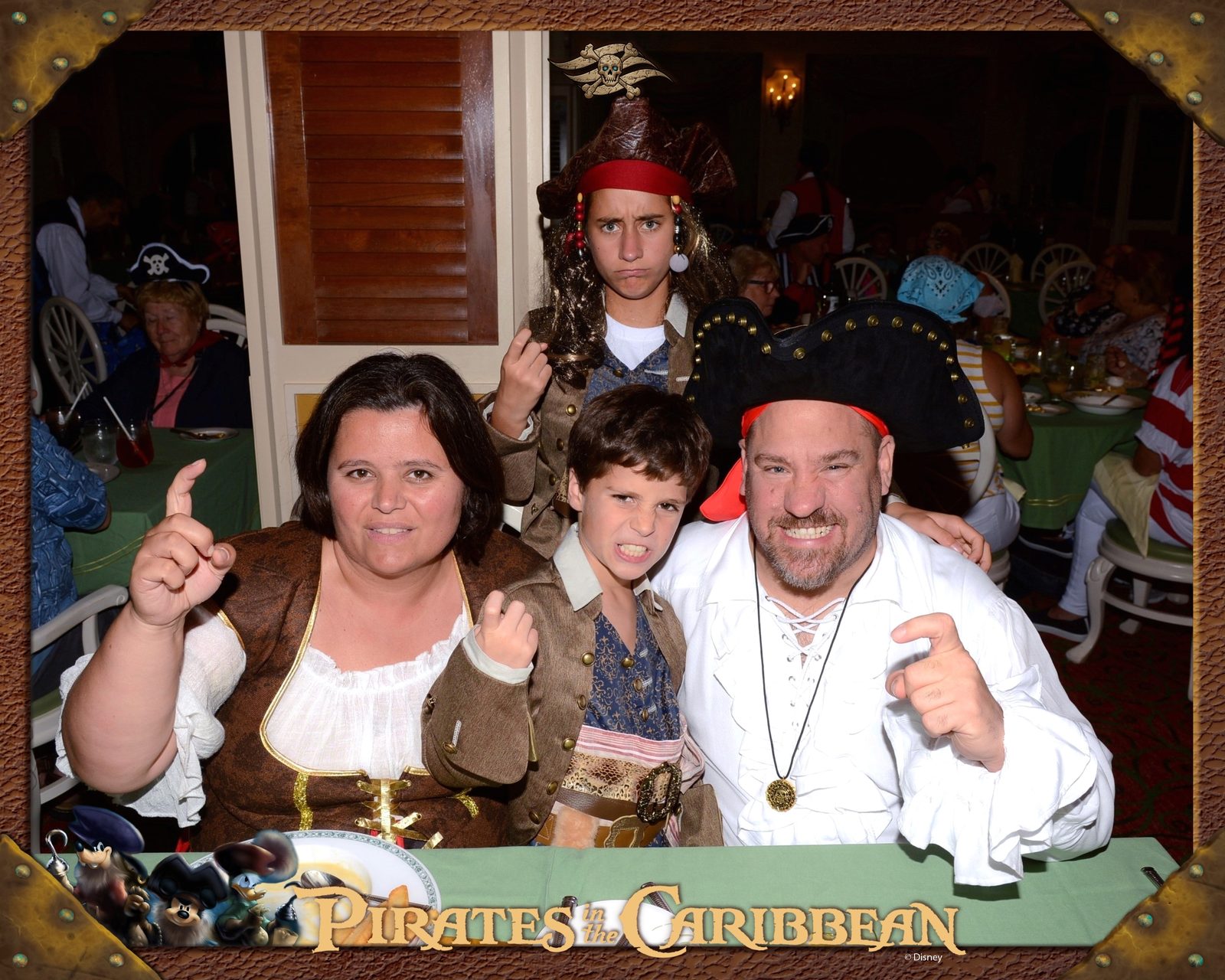 Caught mid-laugh with a pirate crashing our photo