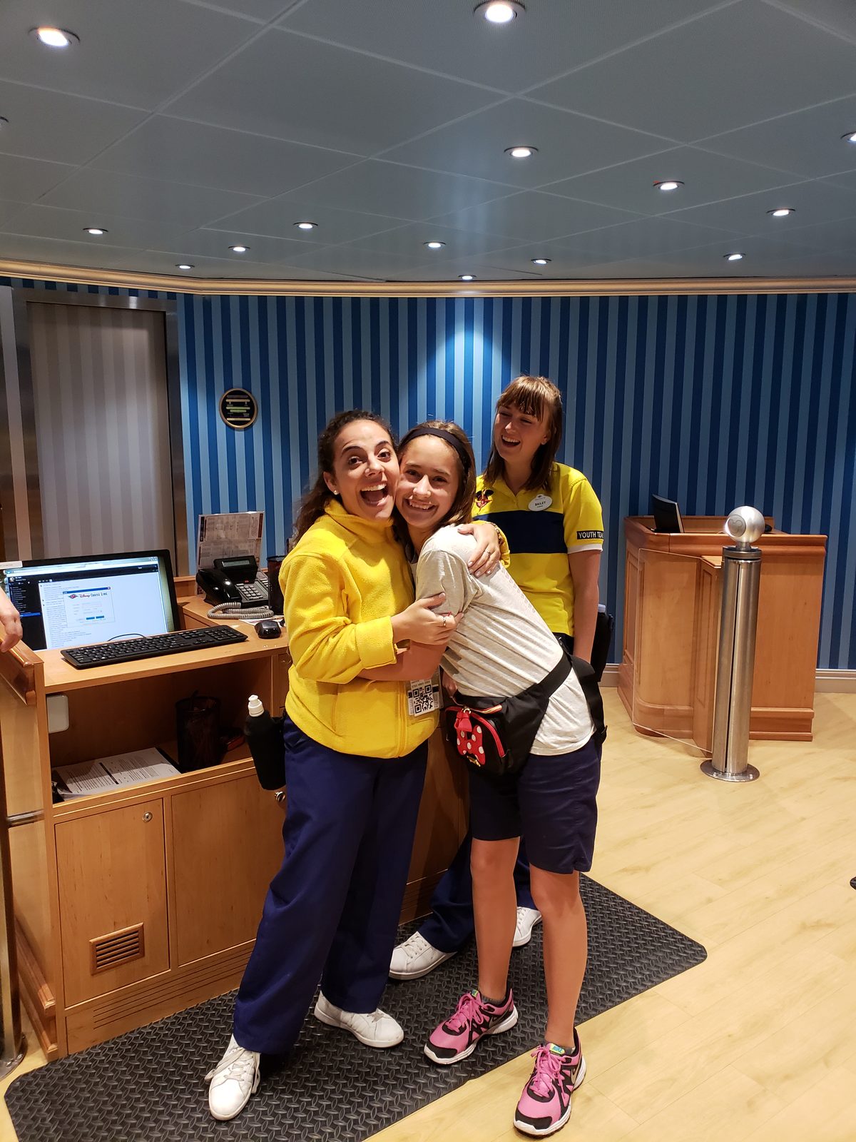 Lisa gets a hug from the Oceaneer Club counselors