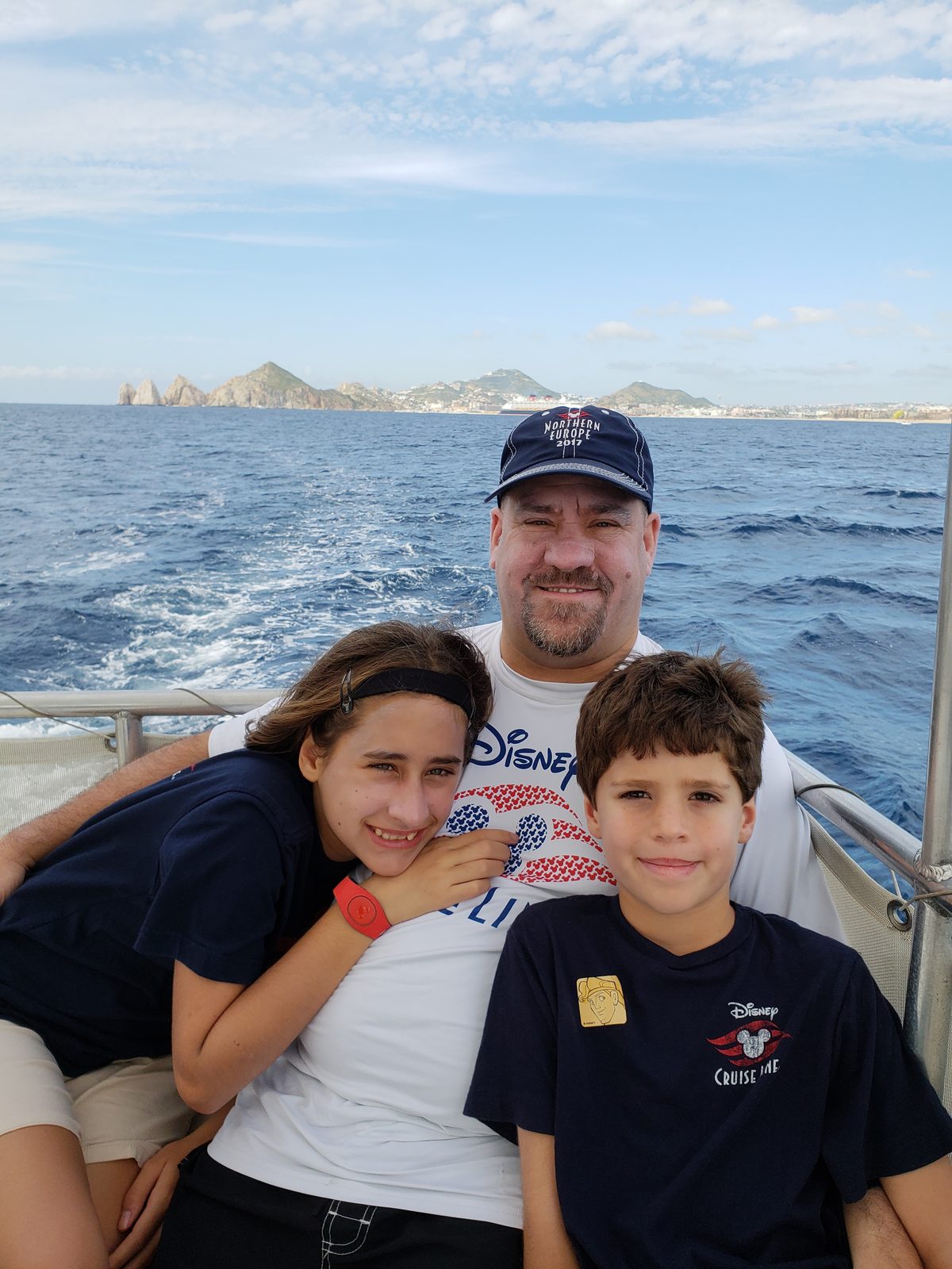 The kids and Michael on the boat at Cabo