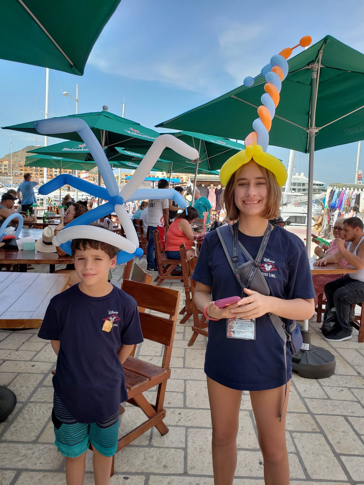 Thomas and Lisa in their balloon hats in Cabo