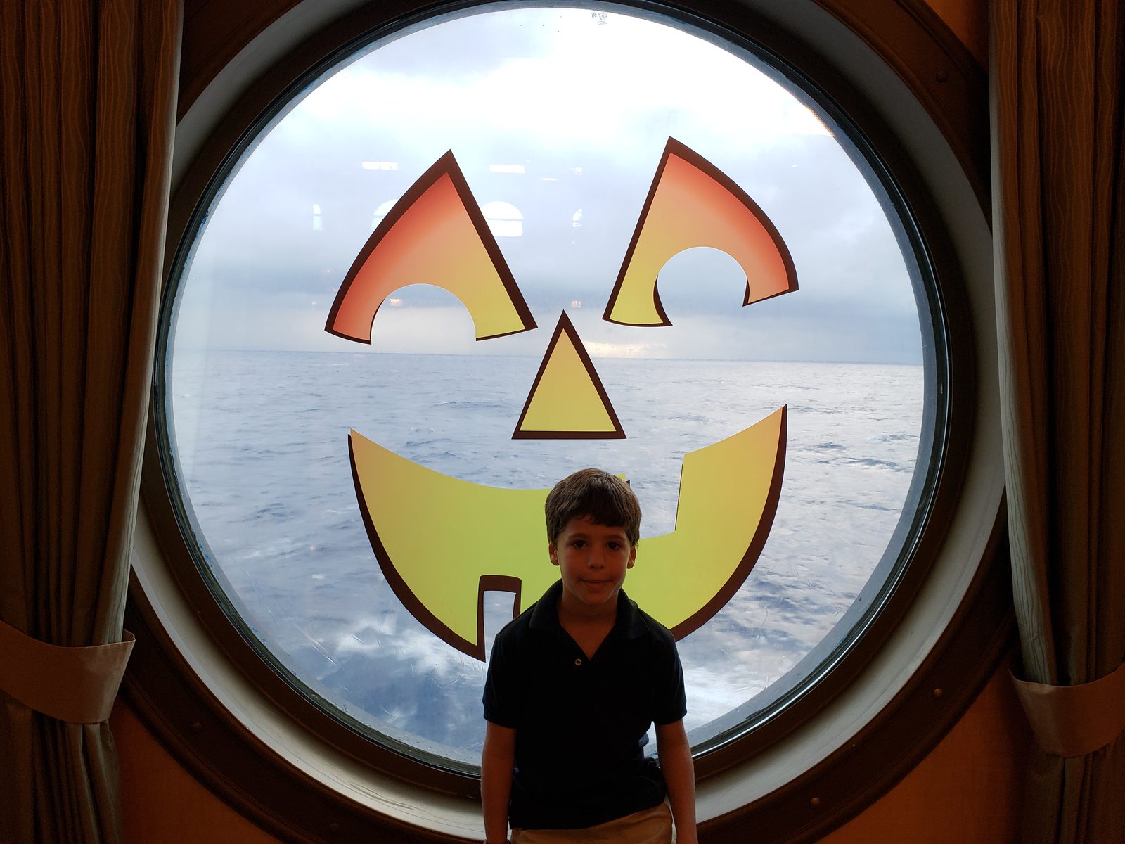 Thomas in the jack-o-lantern porthole