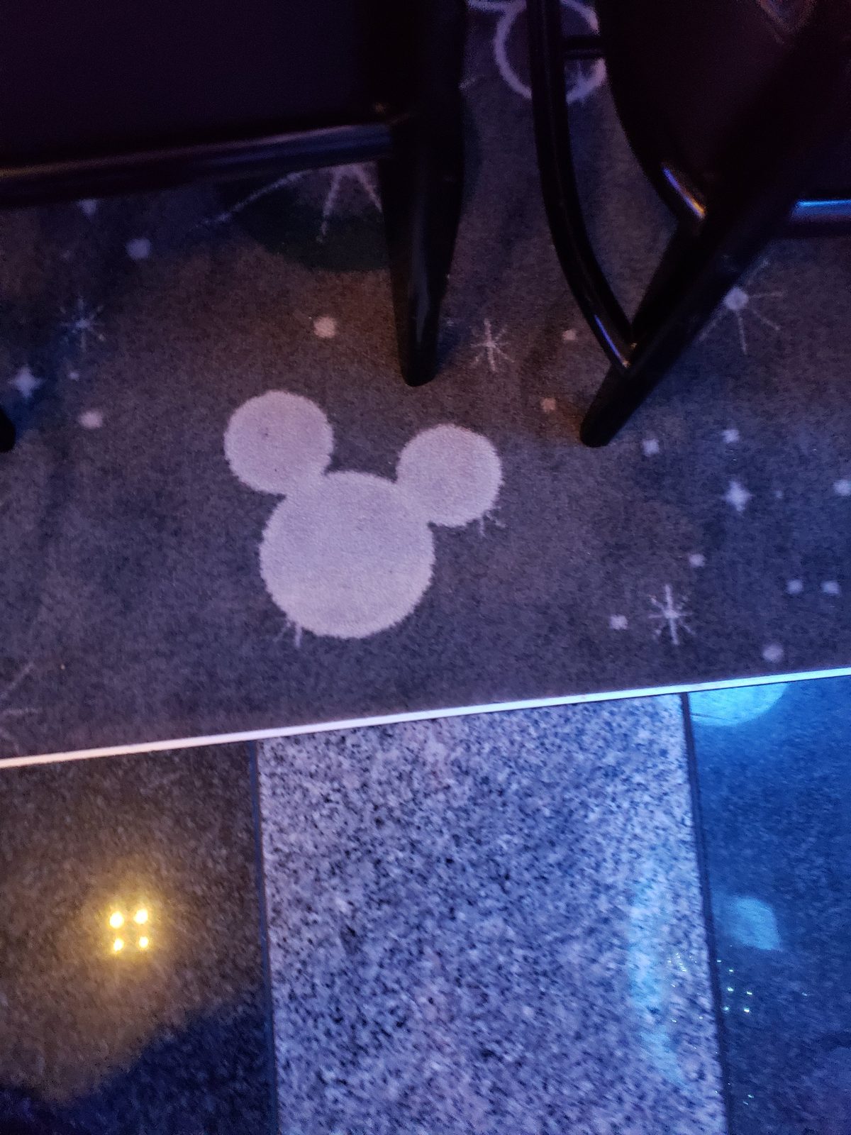 A hidden Mickey glowing under blacklight