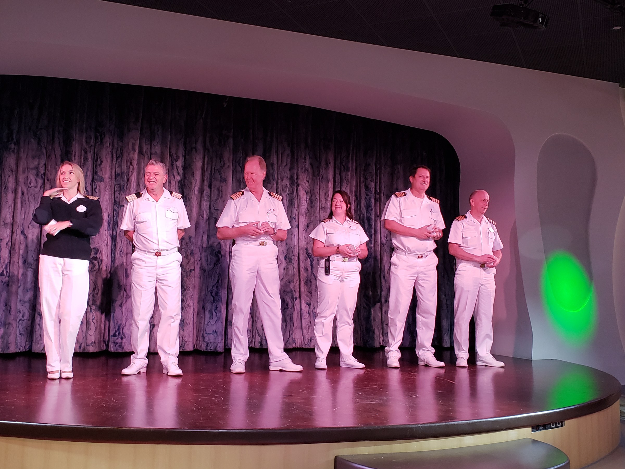 Captain Henry and the ship's officers on stage