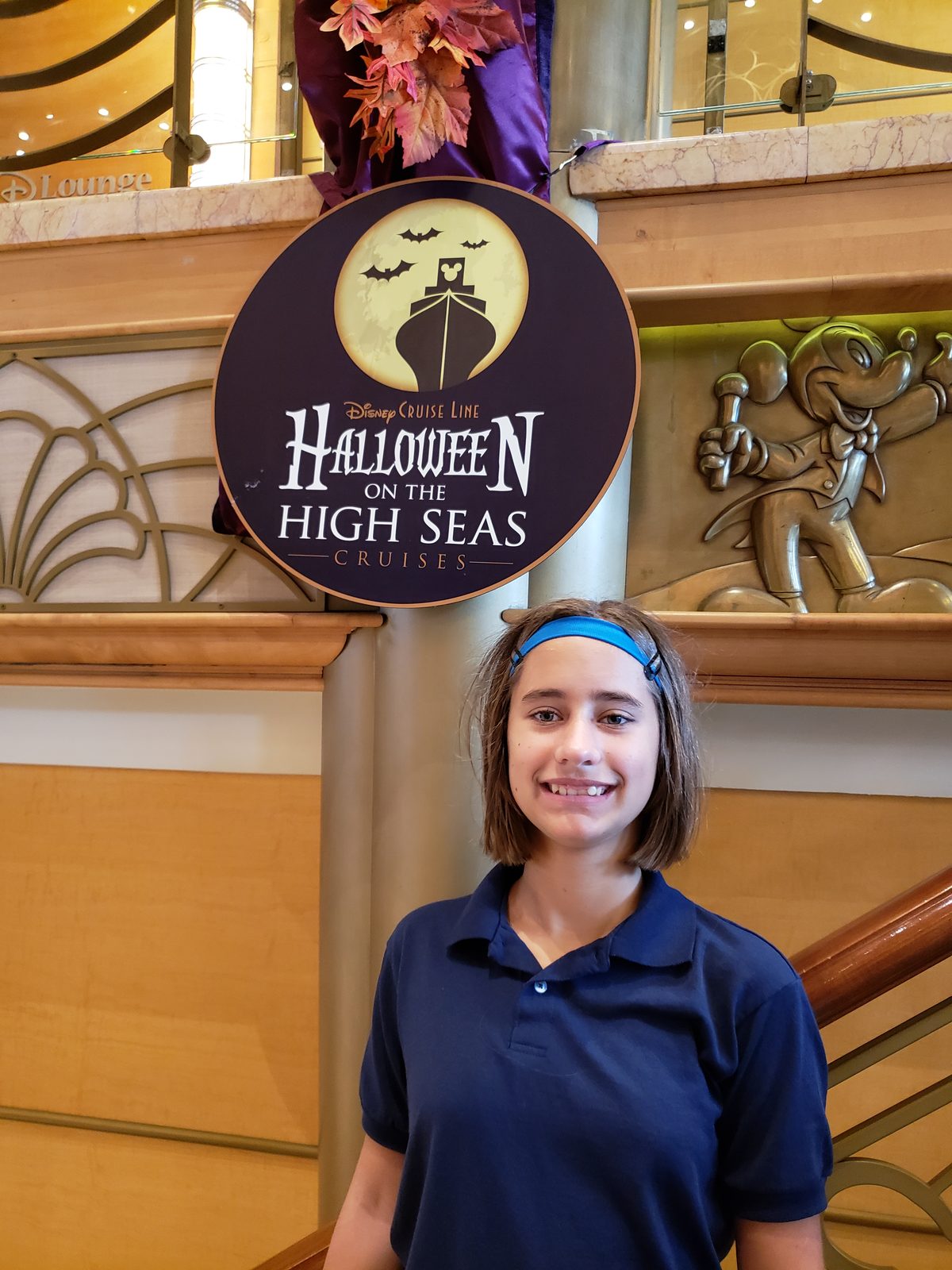 Lisa under the Halloween on the High Seas sign