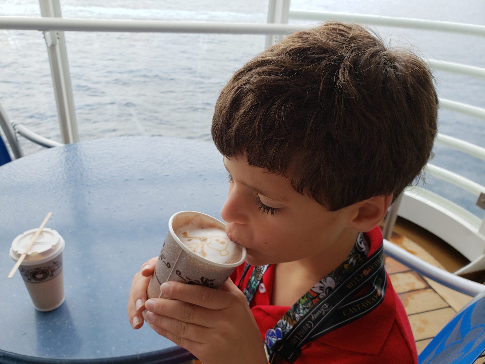 Thomas warming up with cocoa on deck
