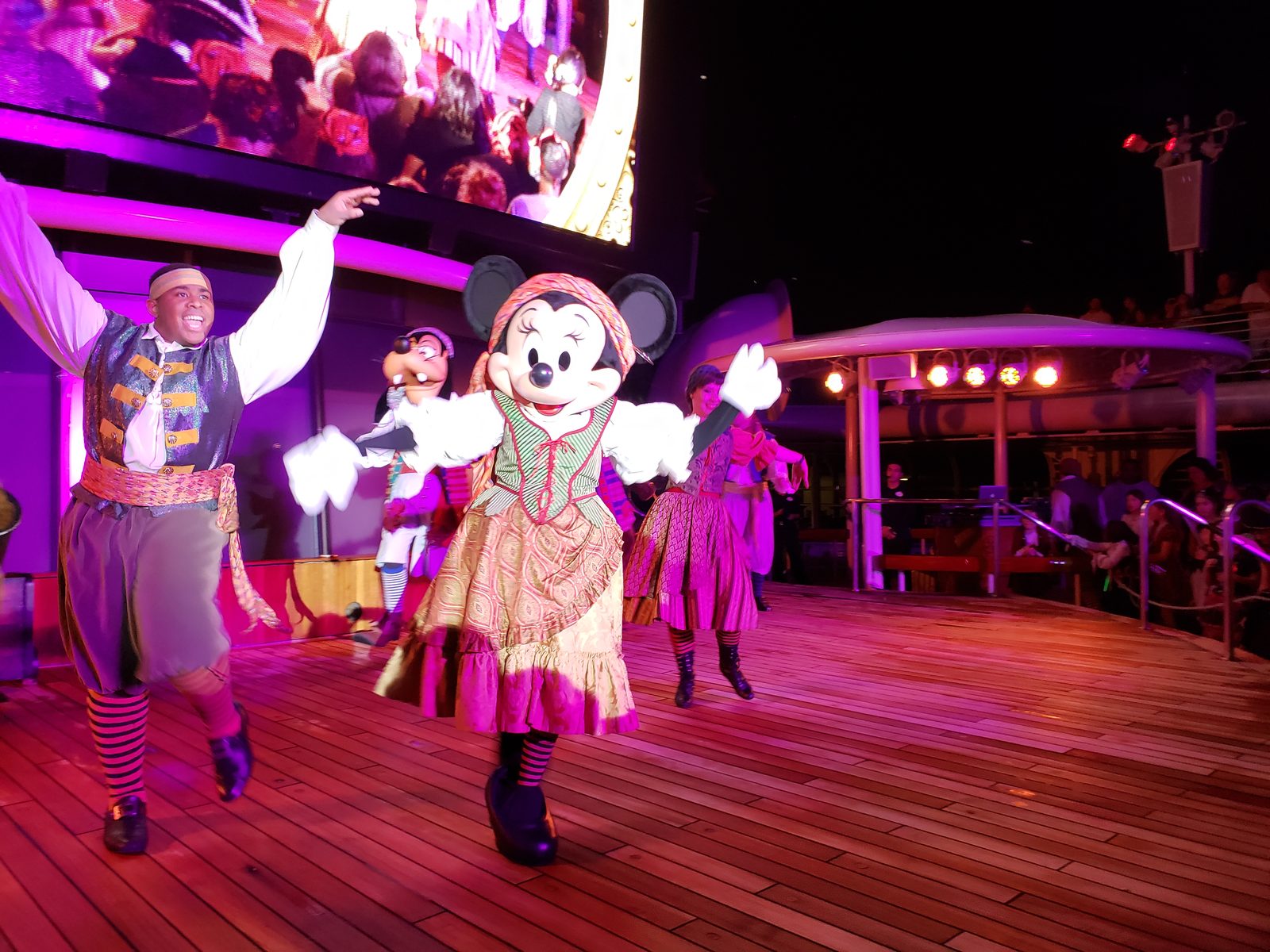 Minnie & Goofy in pirate garb at the Pirates IN the Caribbean Deck Party on Pirate Night