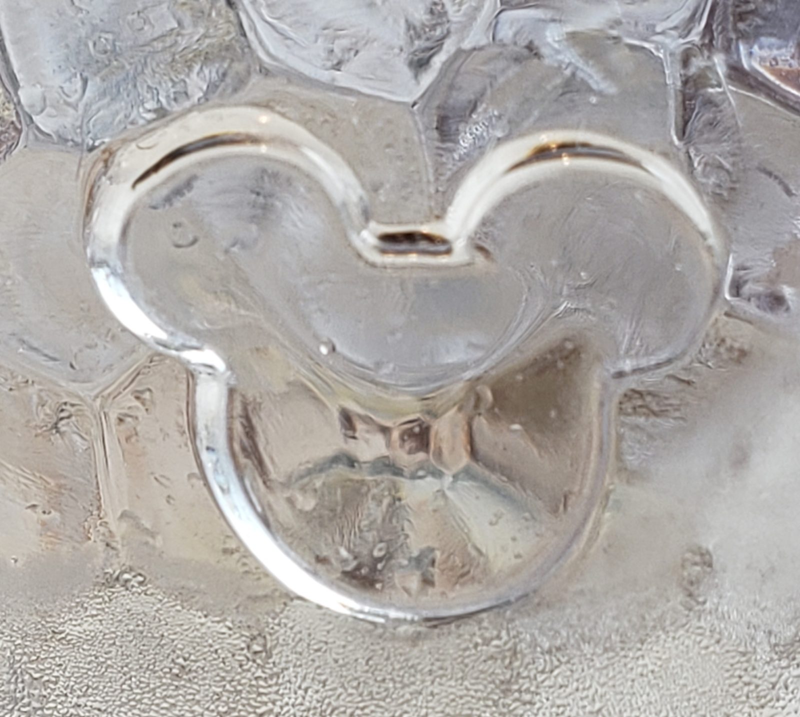 A Mickey shape carved in the ice