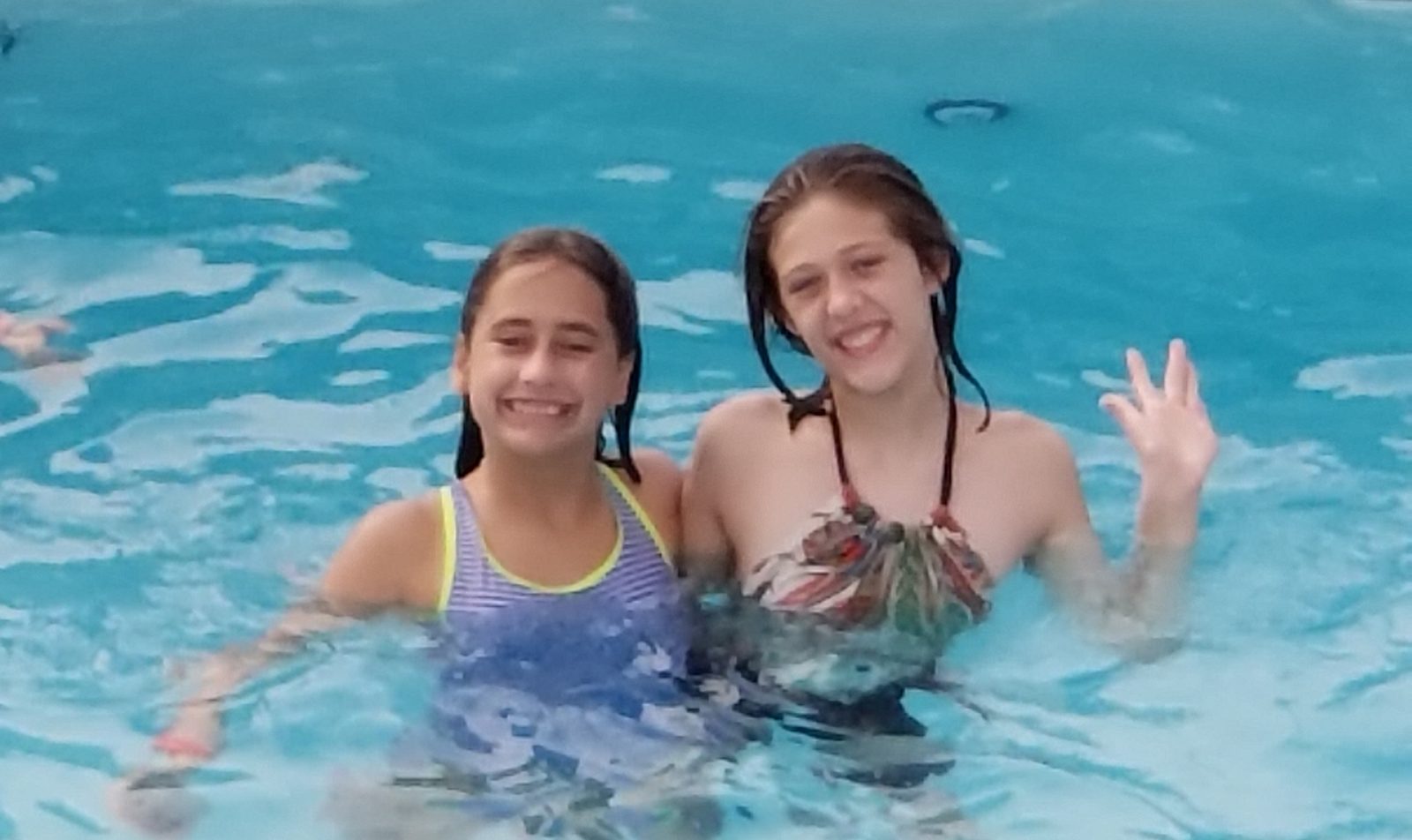 Lisa and a friend in the pool