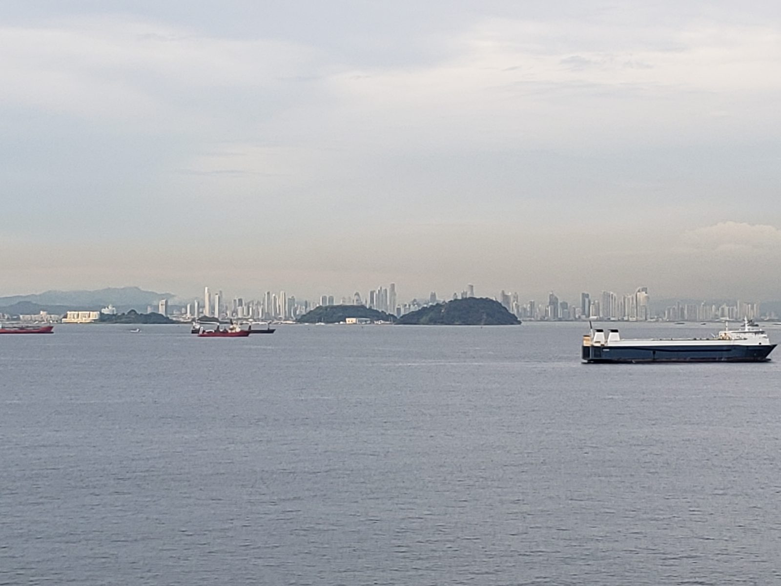 Panama City skyline, ships at anchor