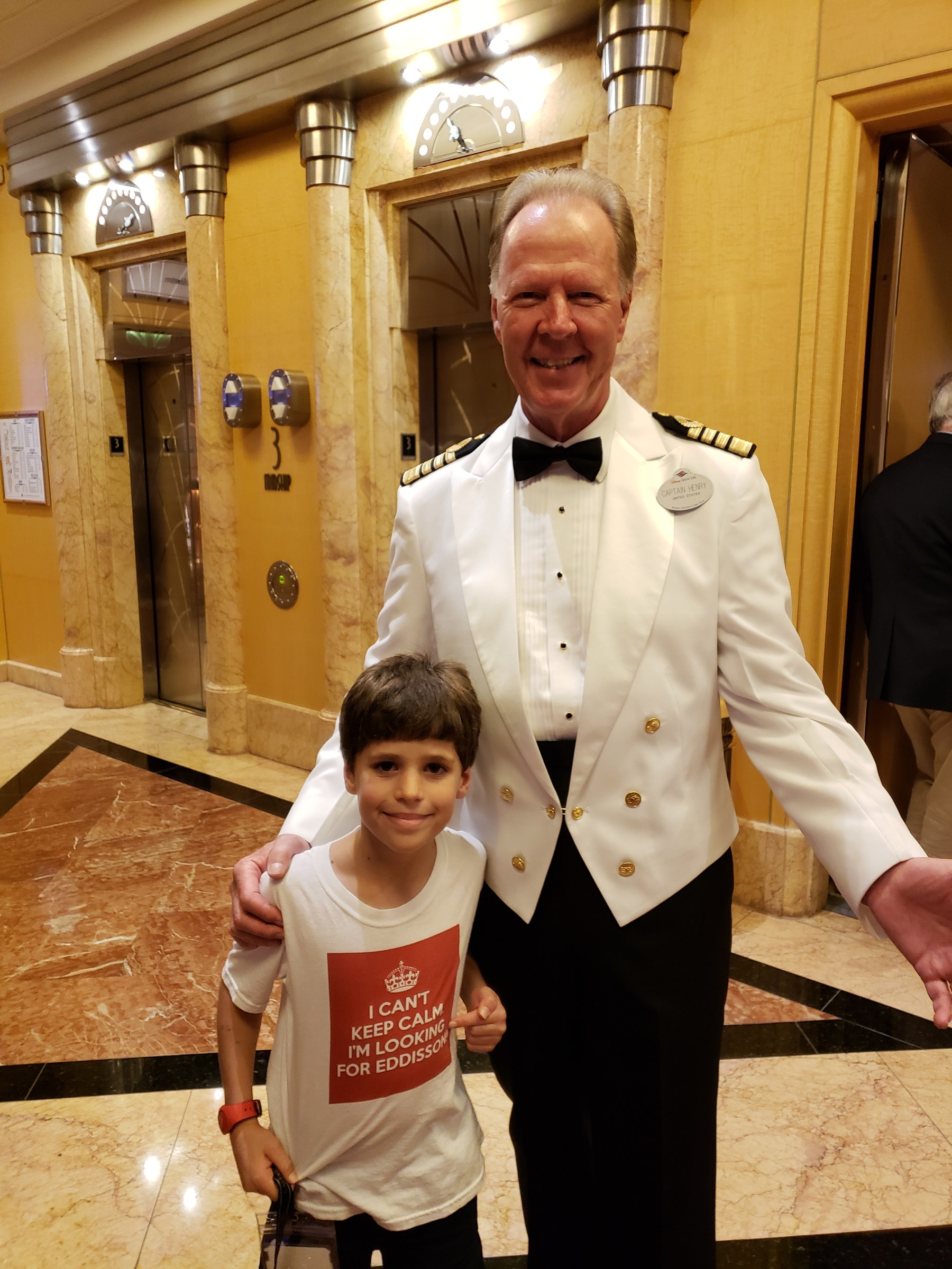 Thomas showing Captain Henry his shirt on formal night