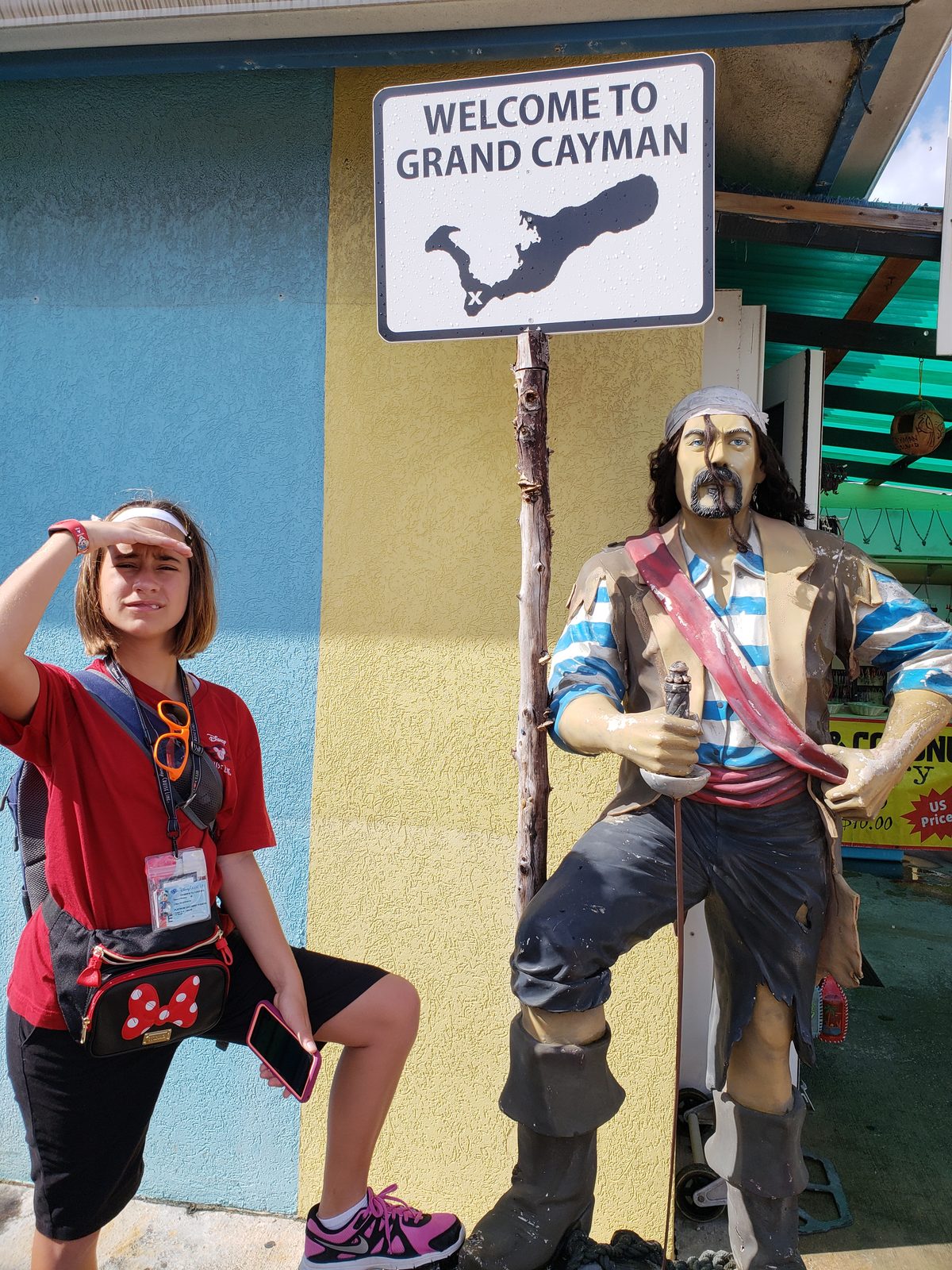 Lisa beside the pirate statue welcoming us to Grand Cayman