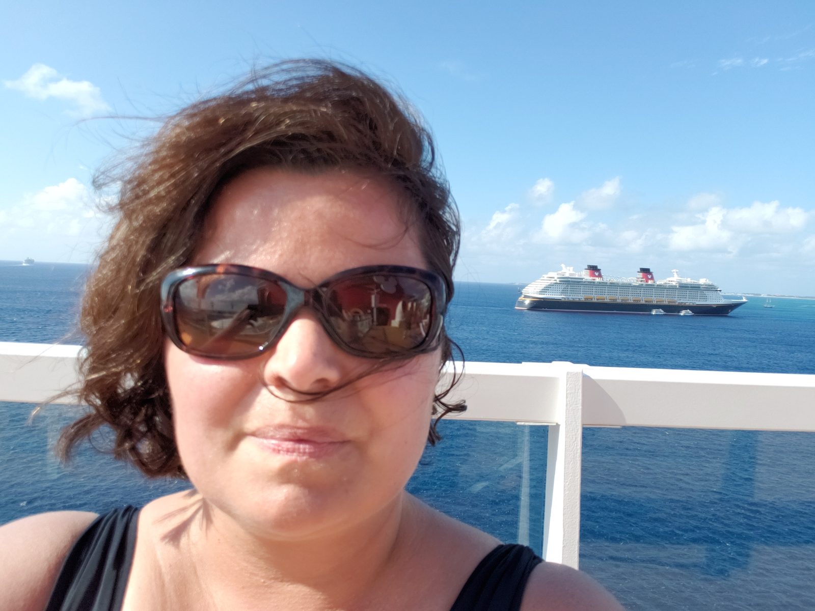 Kathy with the Disney Fantasy behind her