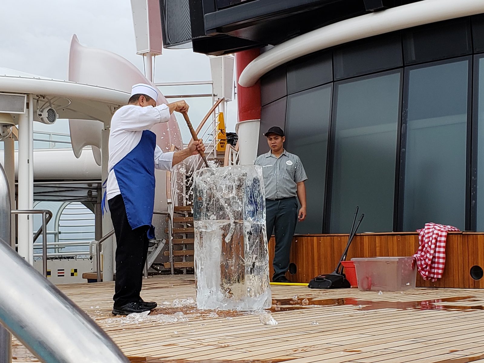 Watching the chef carve an ice sculpture on deck