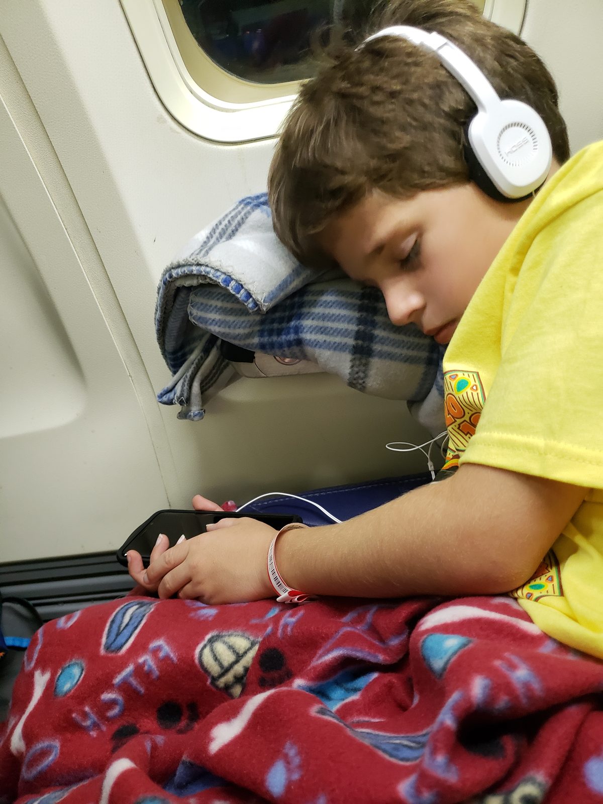 Thomas asleep on the flight home