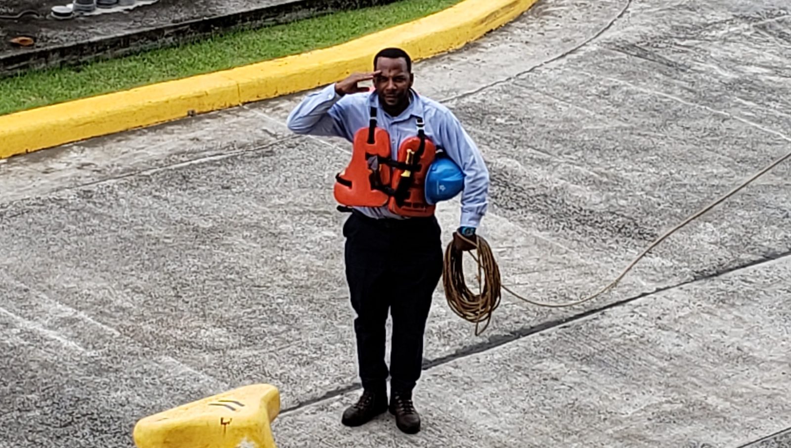 A canal line handler on the lock wall