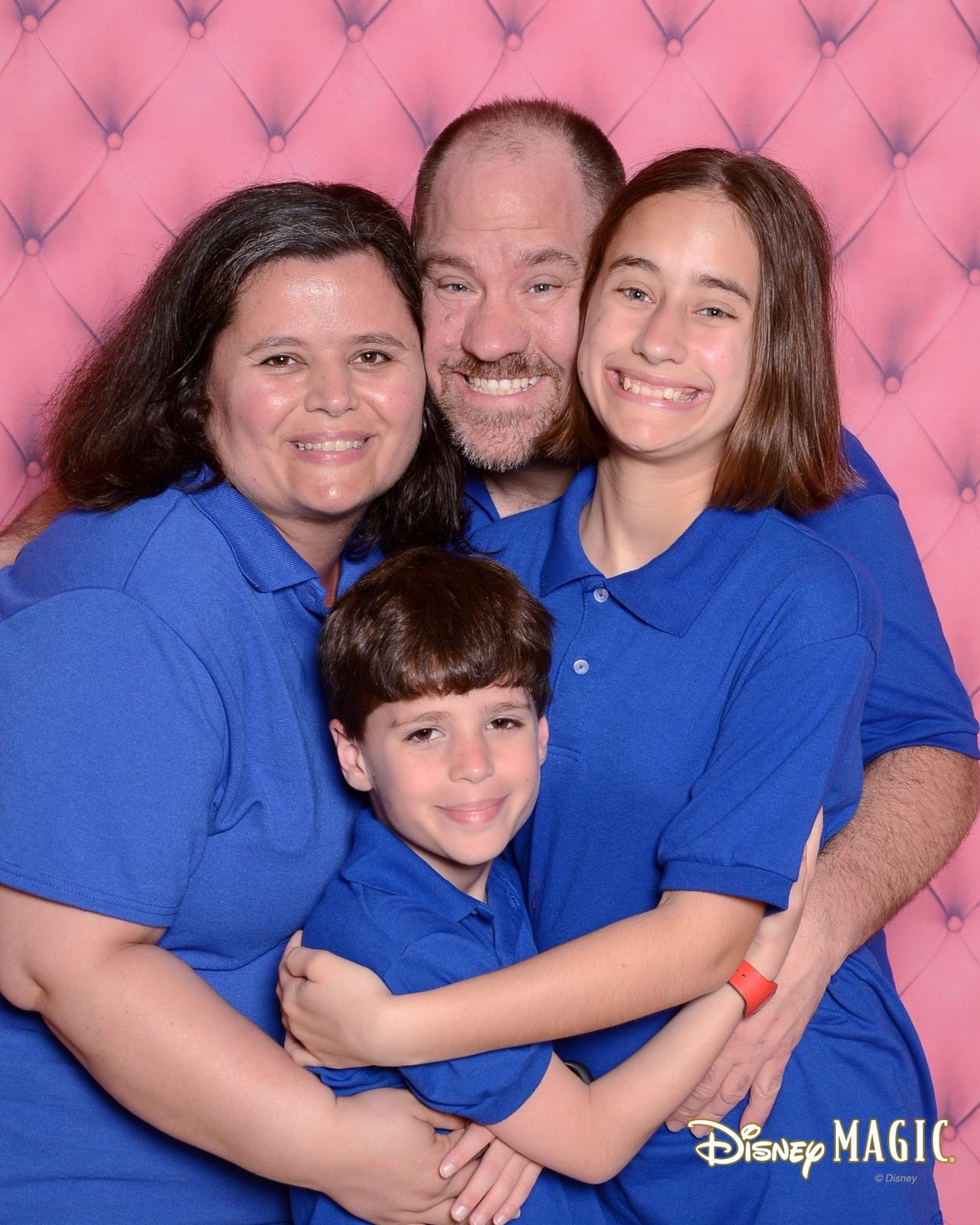 The family together in matching blue