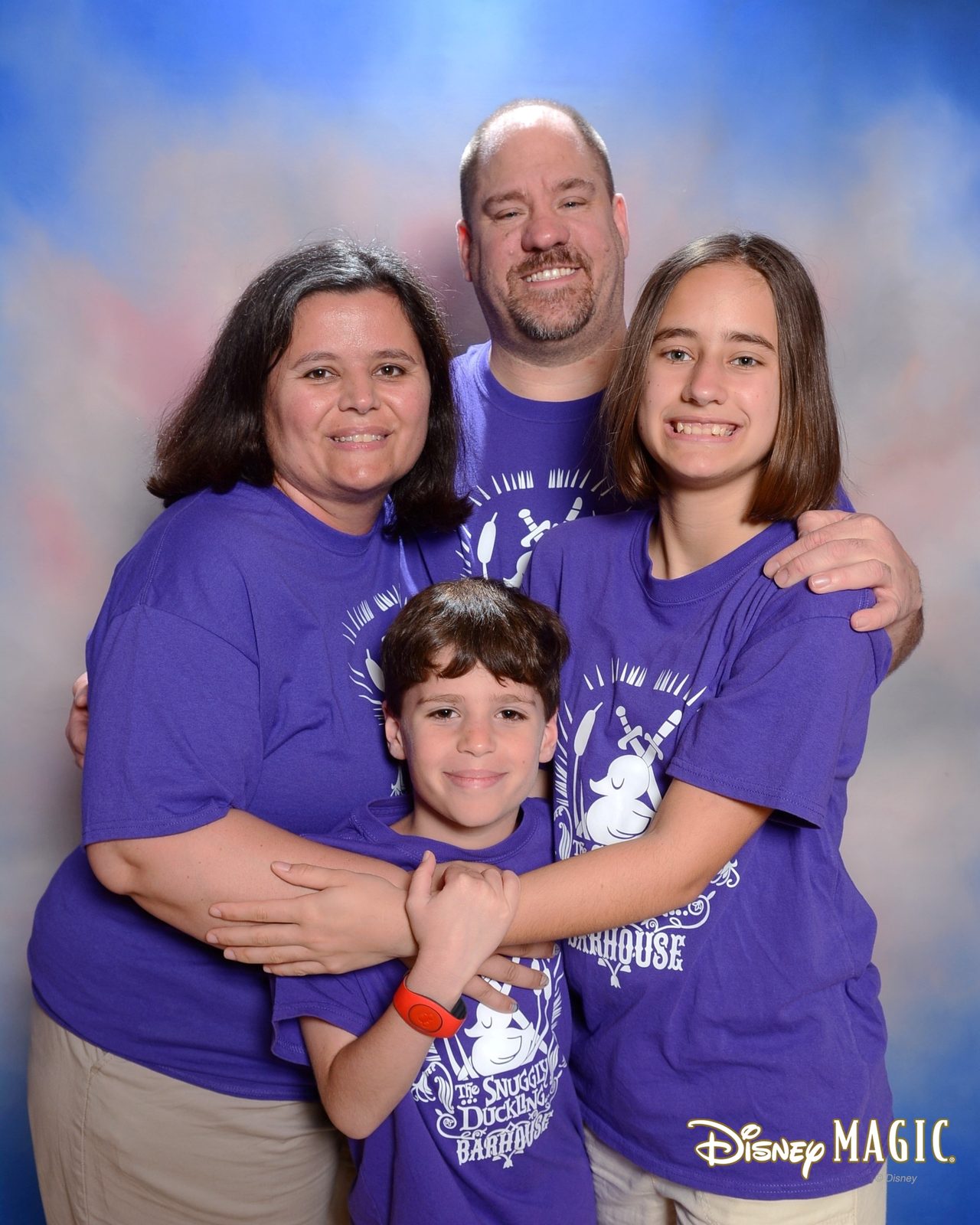 Our studio portrait in the purple shirts