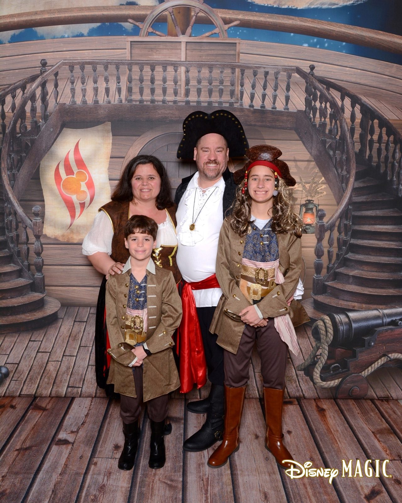 Pirate costumes at the ship's wheel