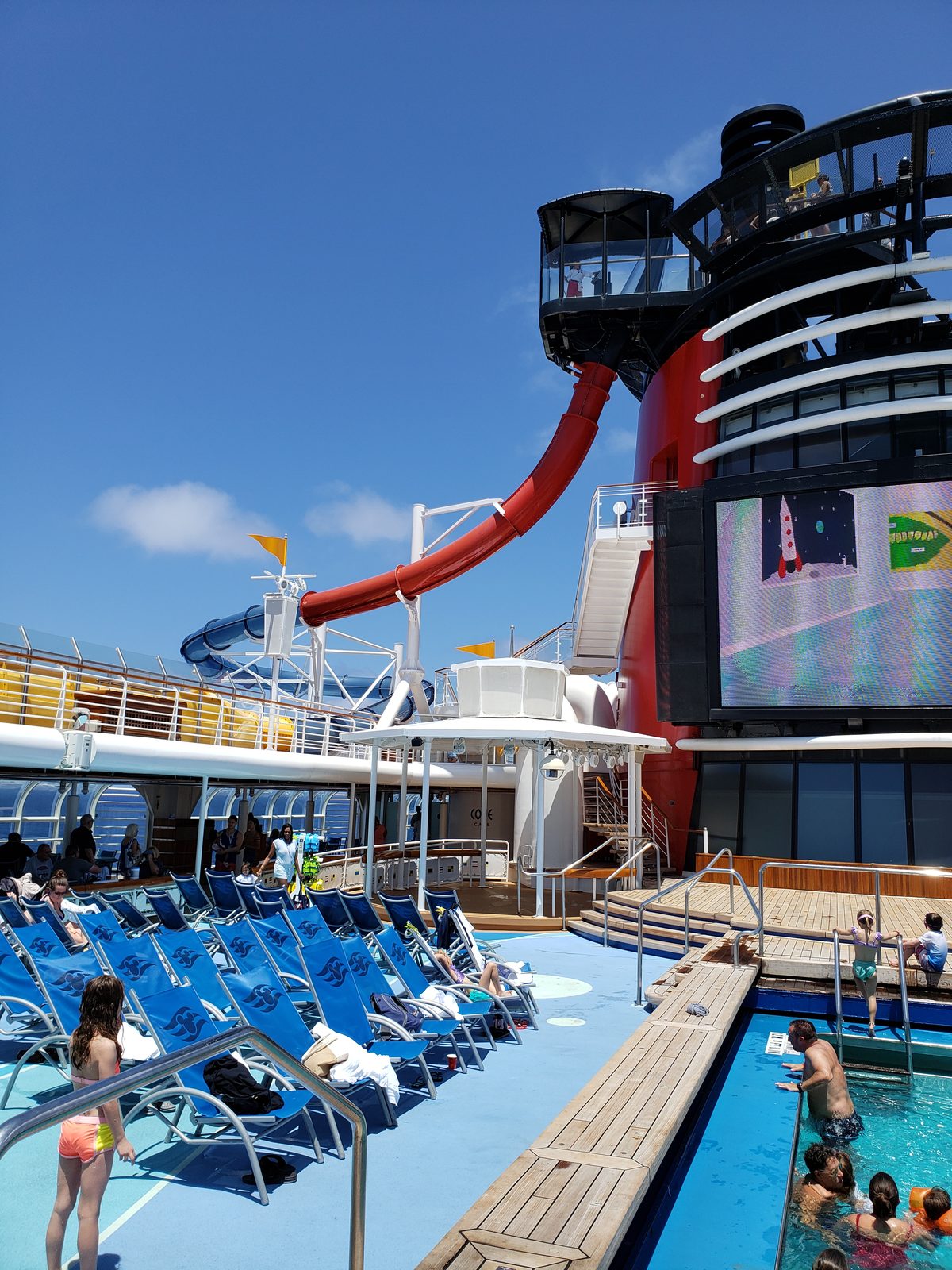 The pool deck and the AquaDunk slide