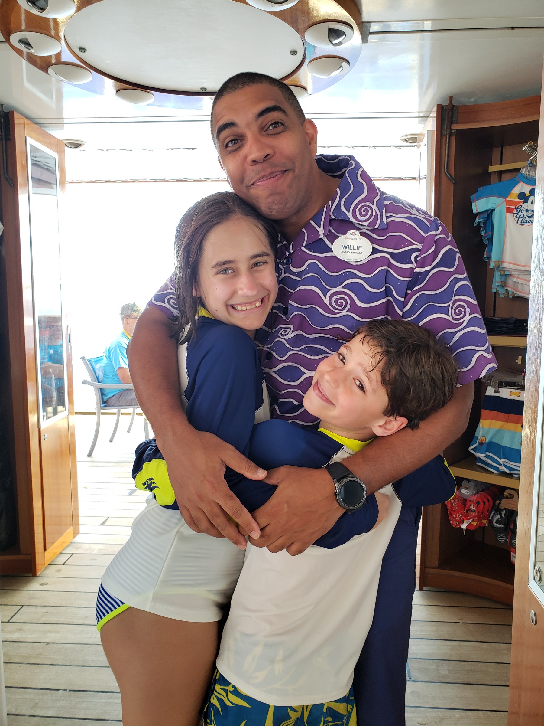 Lisa, Willie and Thomas in a hug