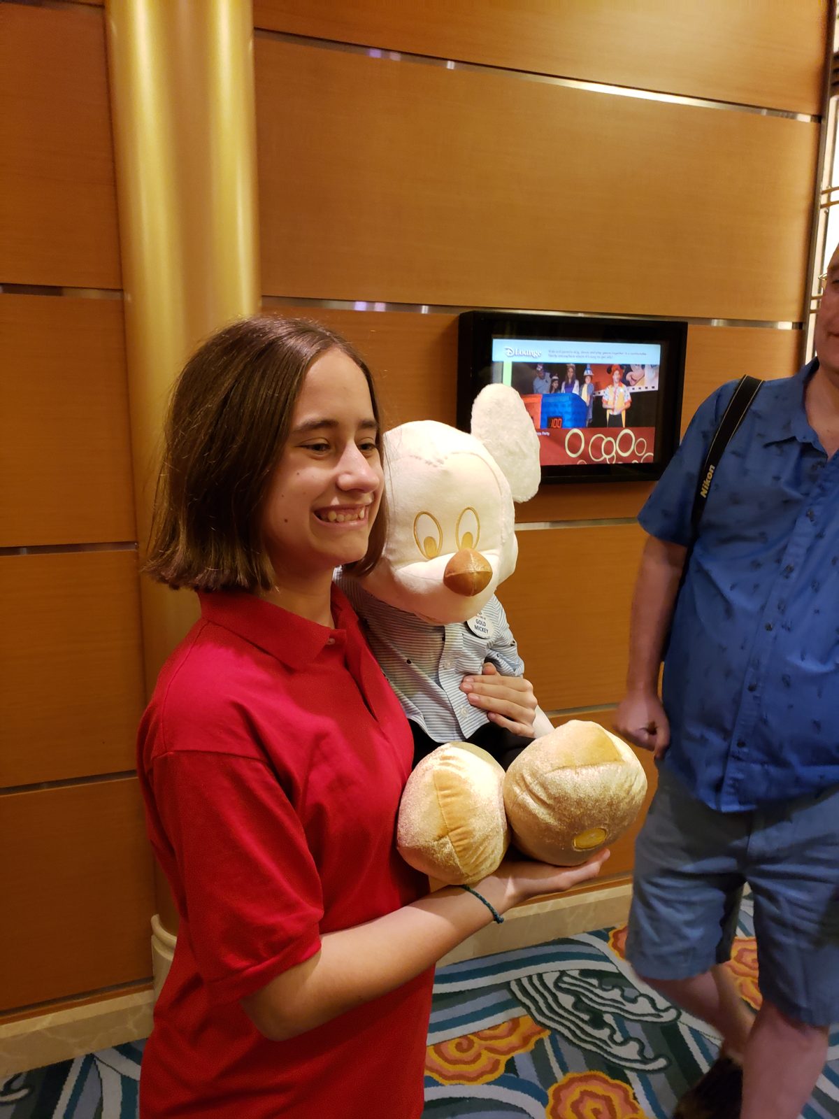 Lisa with a giant Mickey plush after midnight