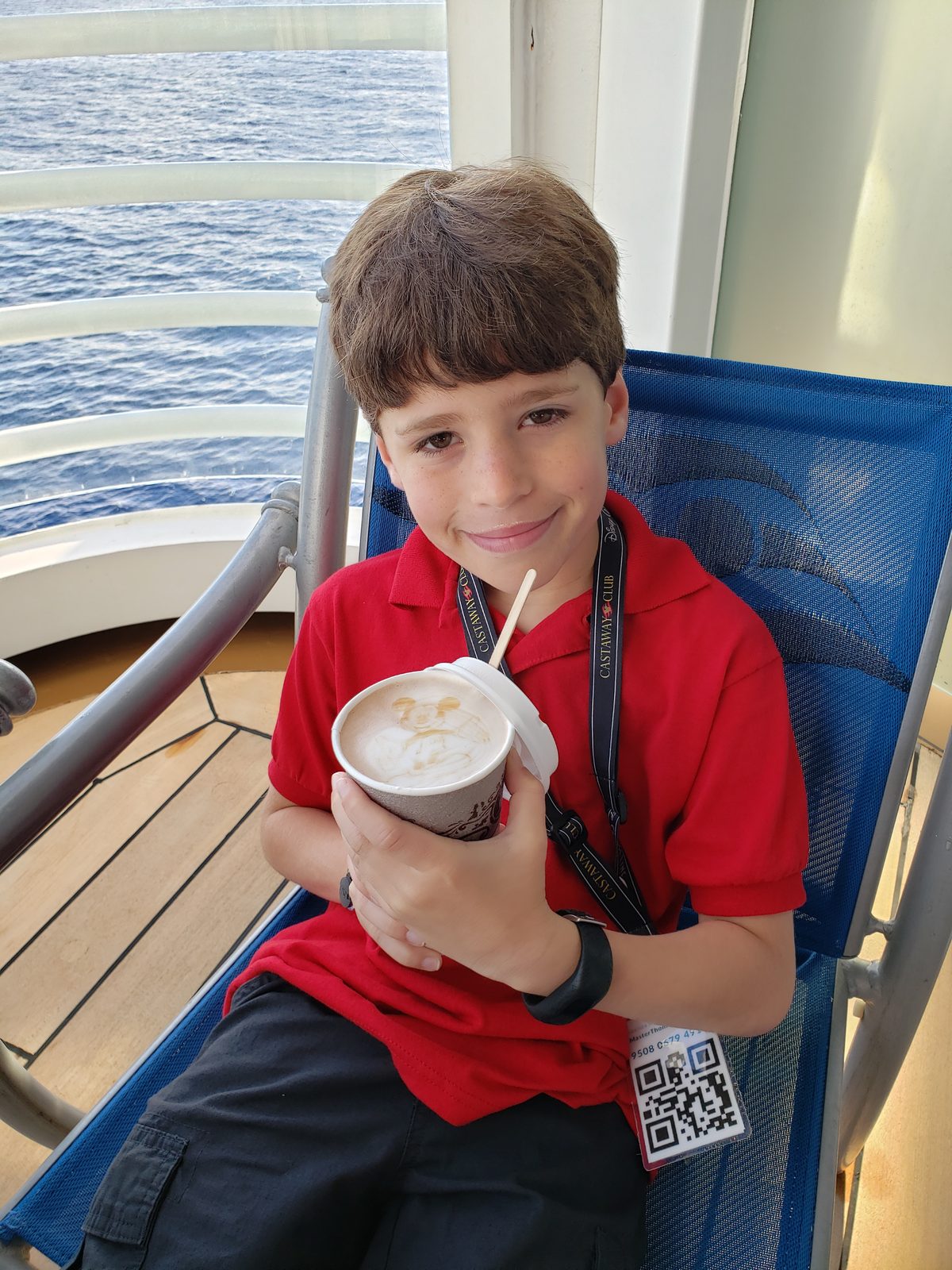 Thomas with a drink on deck on the Magic