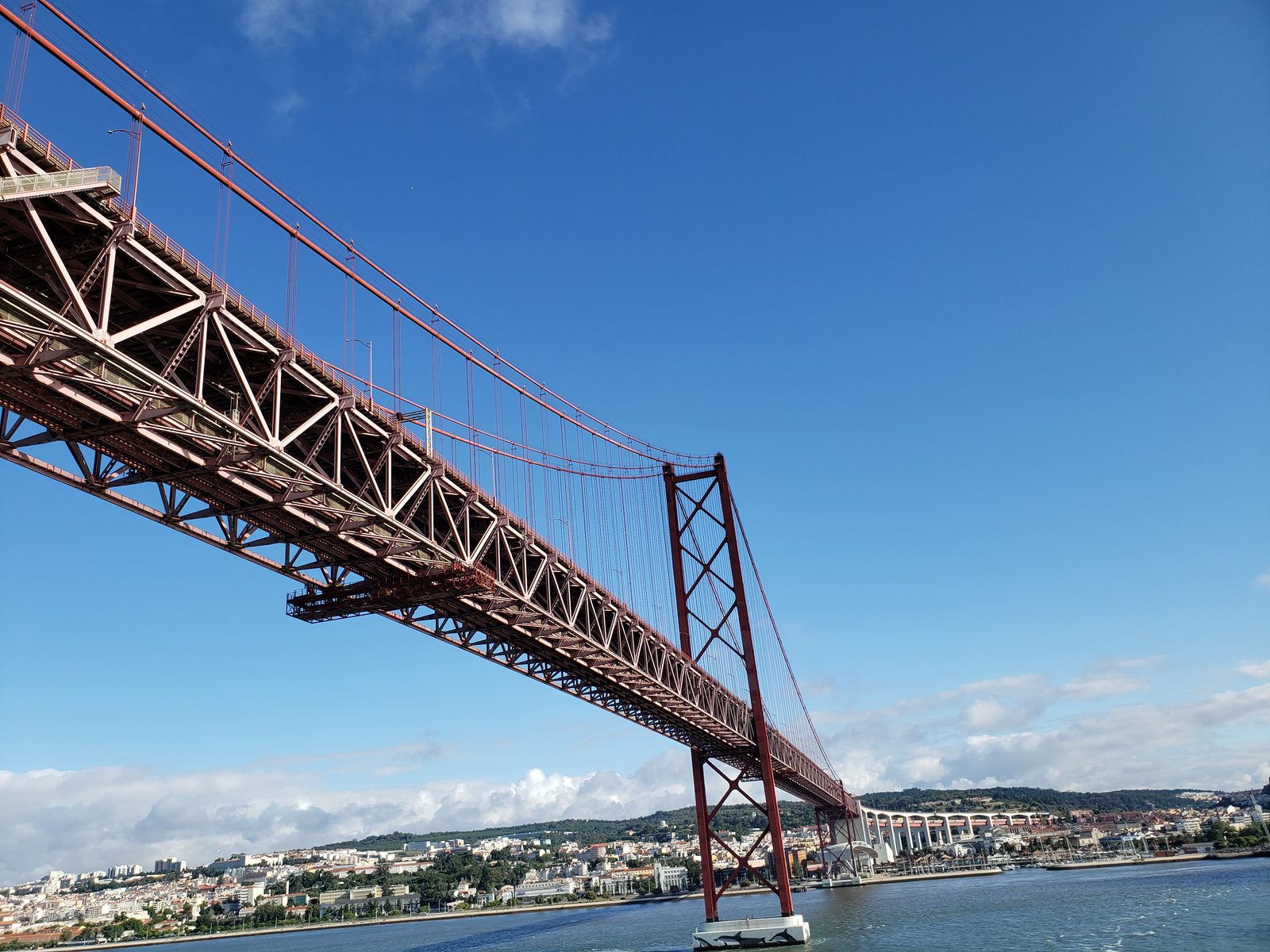 Under the 25 de Abril Bridge coming into Lisbon