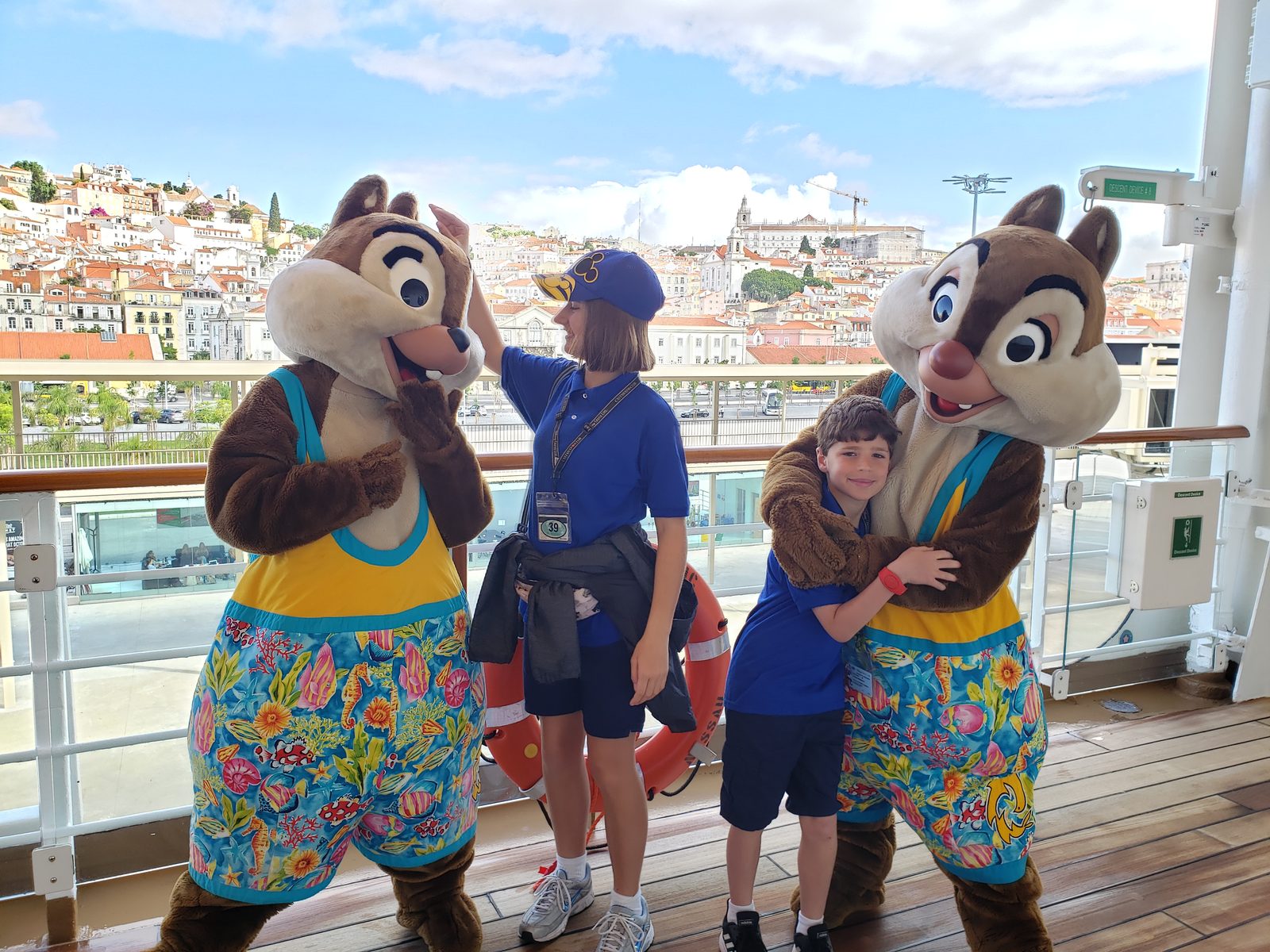 Chip, Lisa, Thomas & Dale in their tropical beachwear outfits on deck in Lisbon