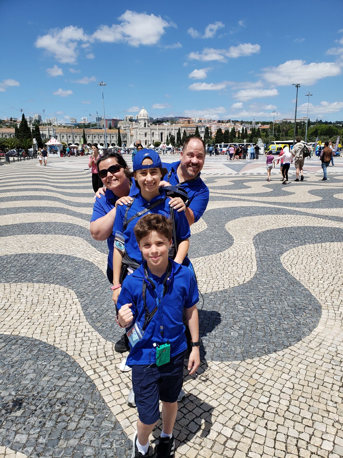 The whole family at the Discoveries monument