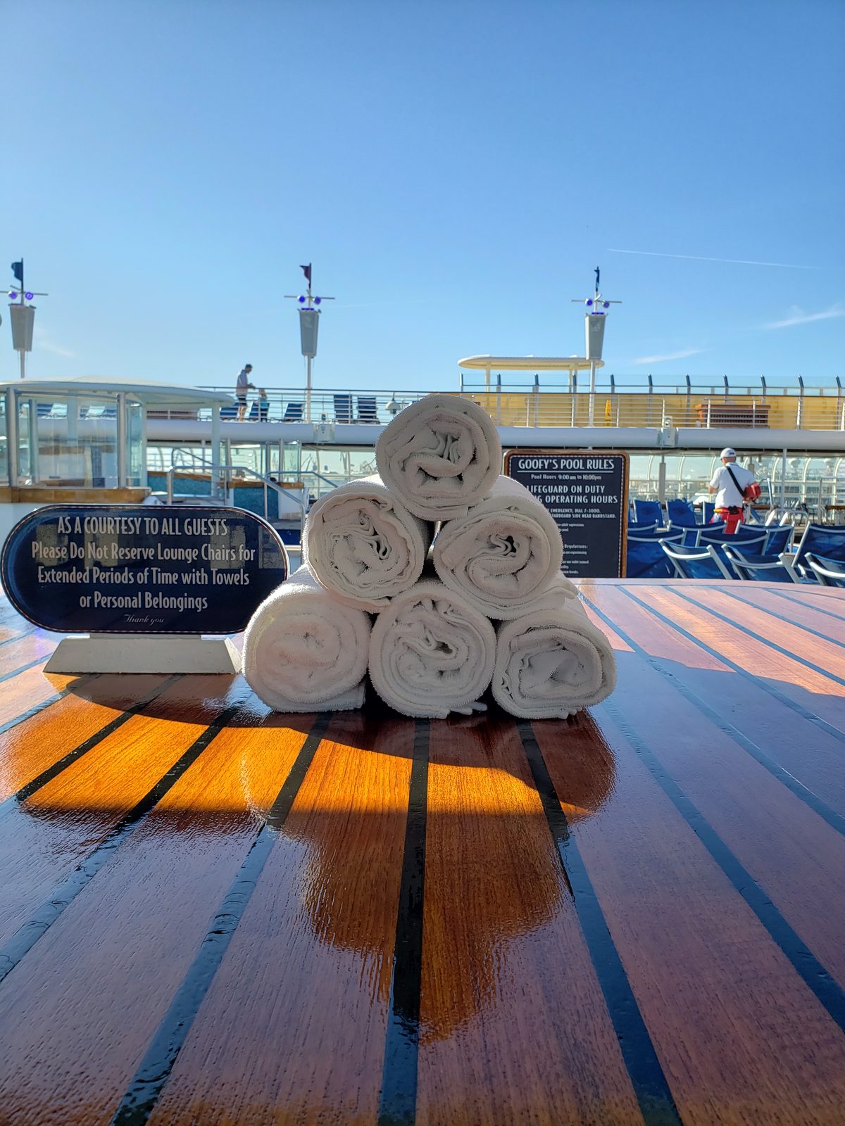 Pool towels stacked on Deck 9 of the Magic