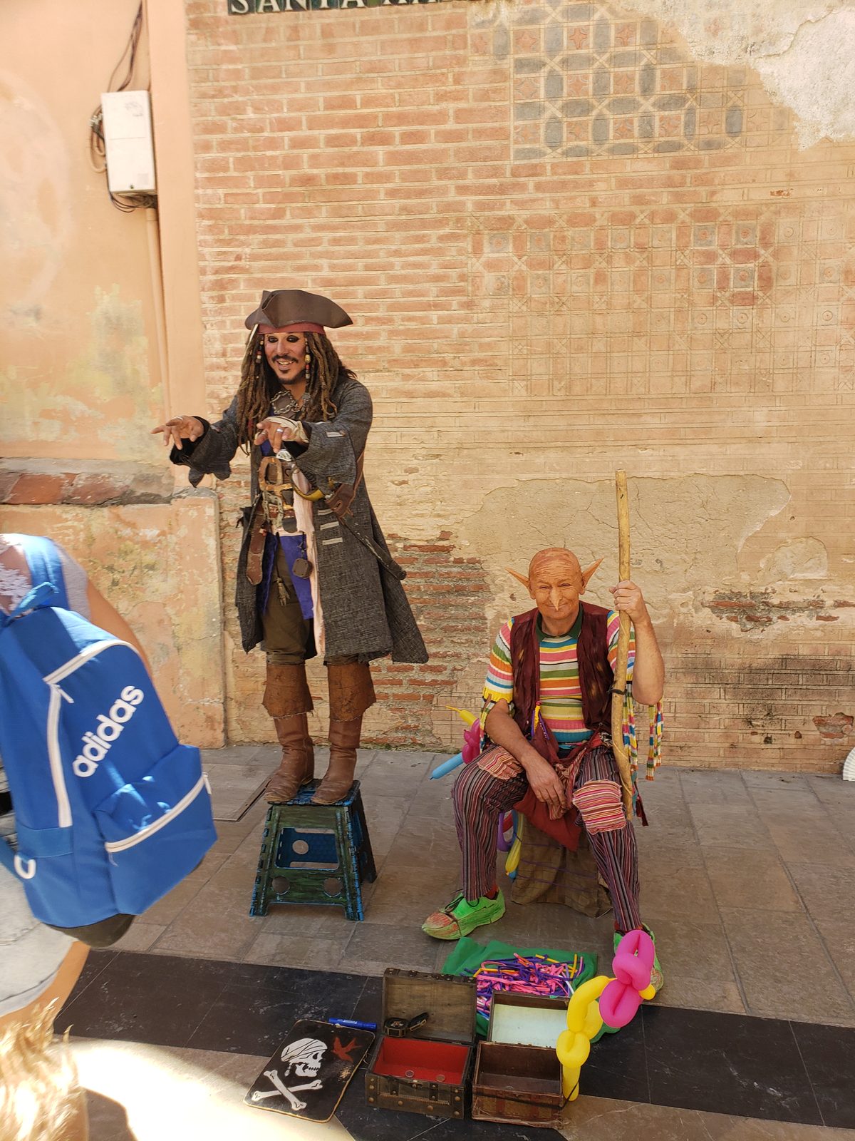 A pirate street performer near the plaza