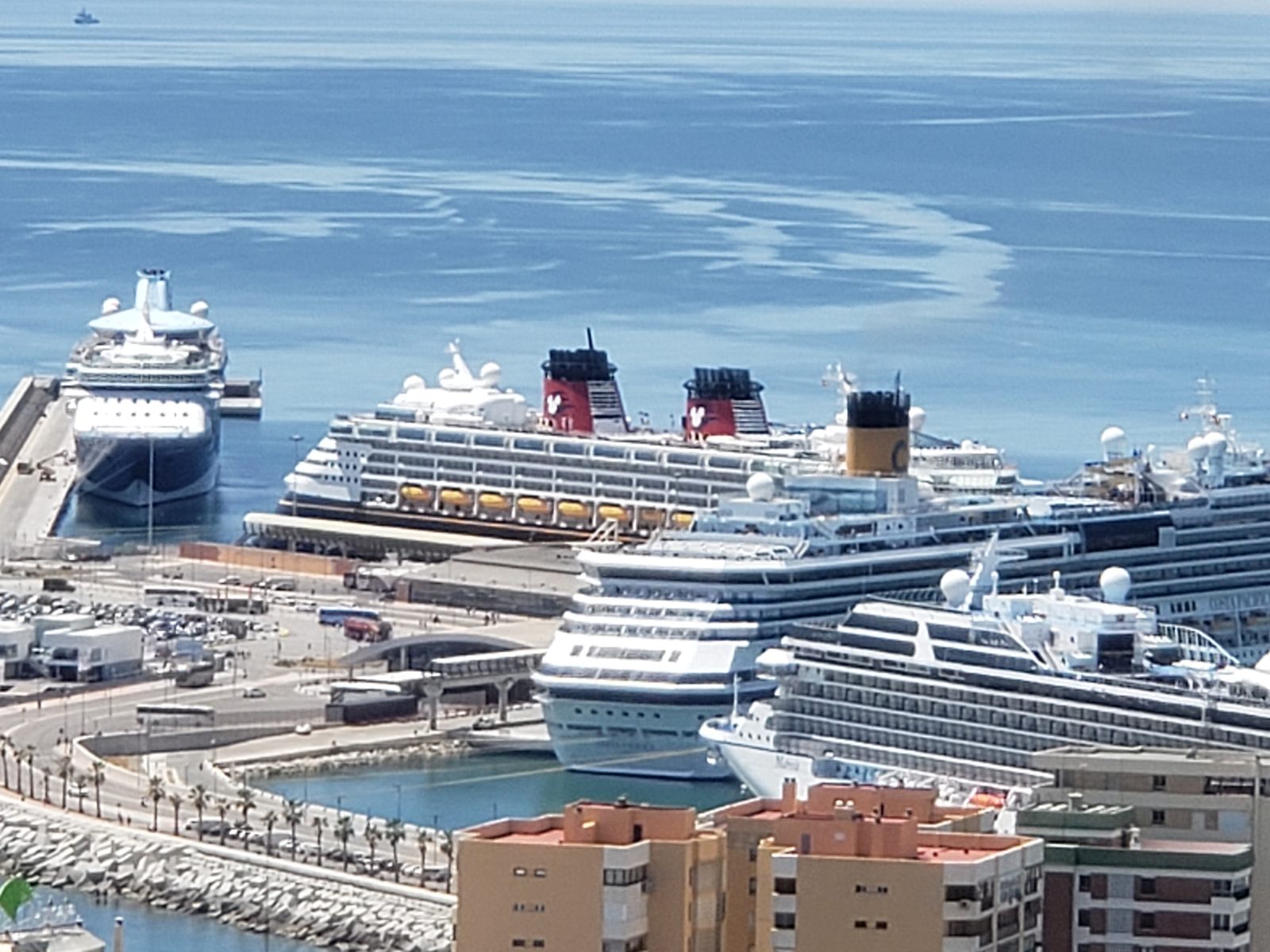 The Disney Magic docked below the castle