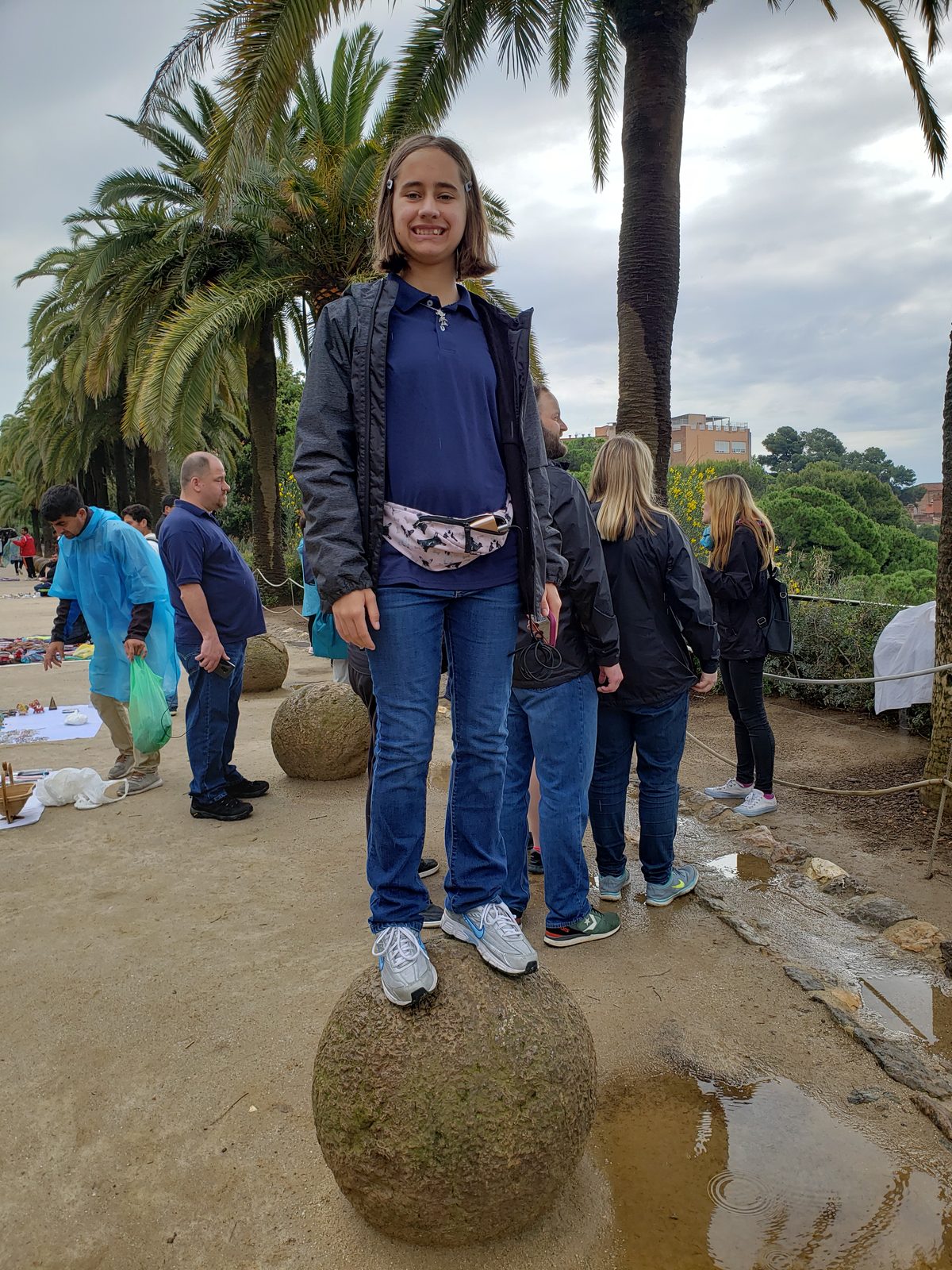 Lisa on a stone ball in Park Güell
