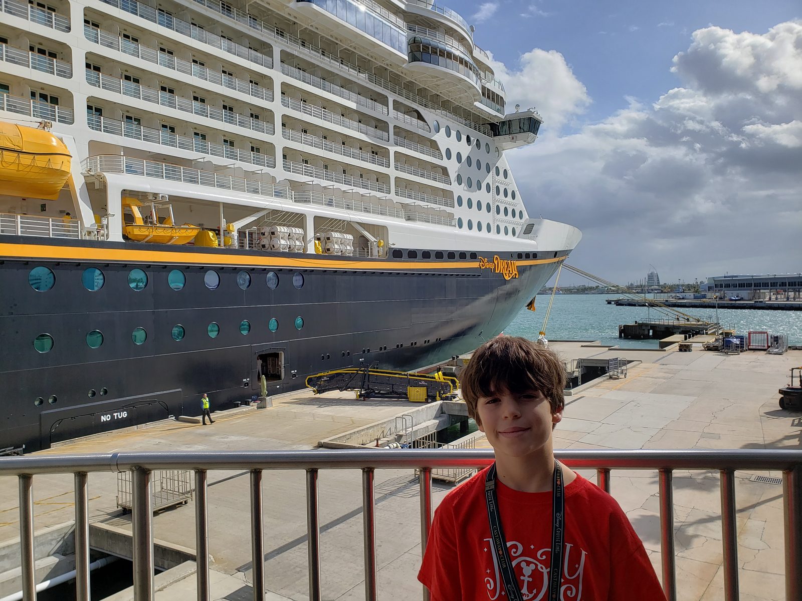 Thomas on deck in Port Canaveral with another ship docked