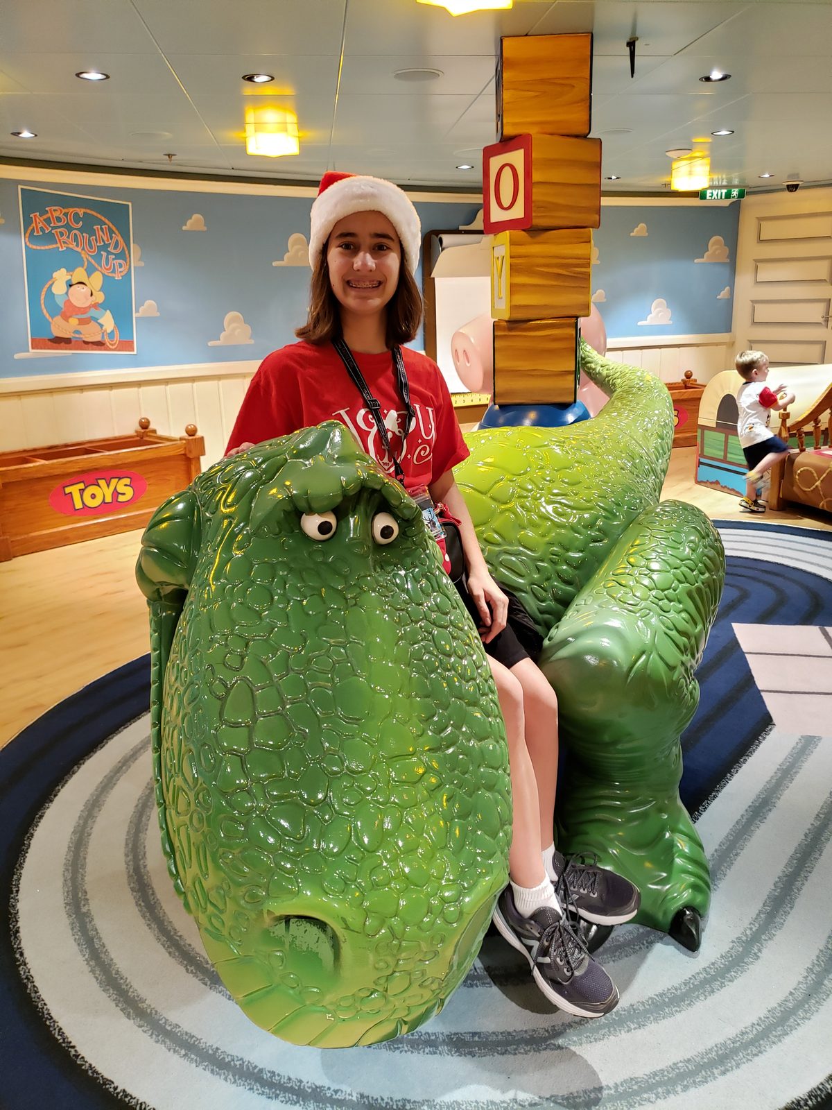 Lisa on the giant dinosaur in the Oceaneer Club