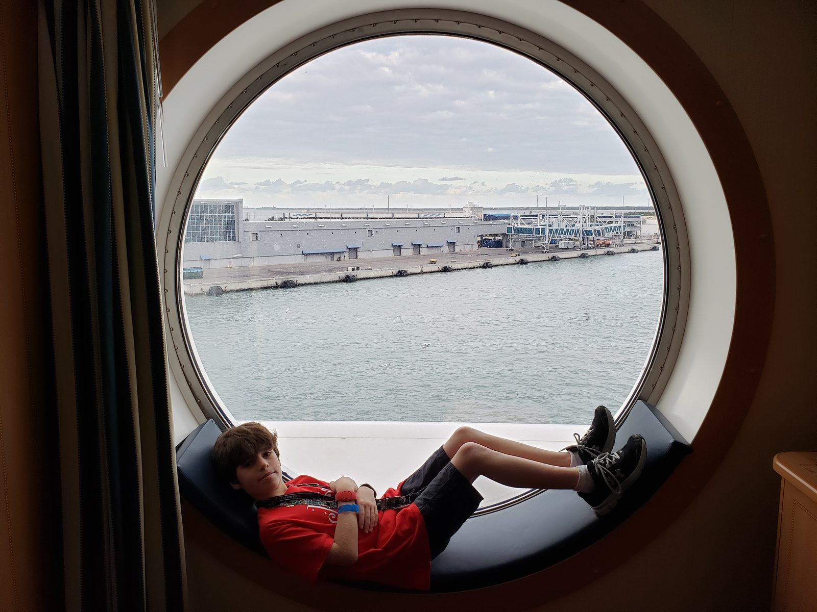 At our stateroom porthole in Port Canaveral