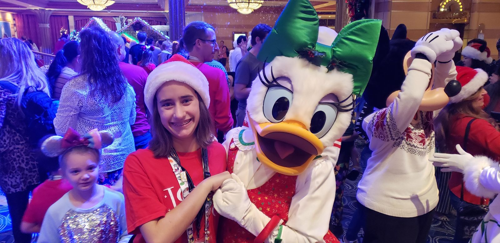 Lisa with Daisy Duck in her Christmas outfit in the Lobby Atrium