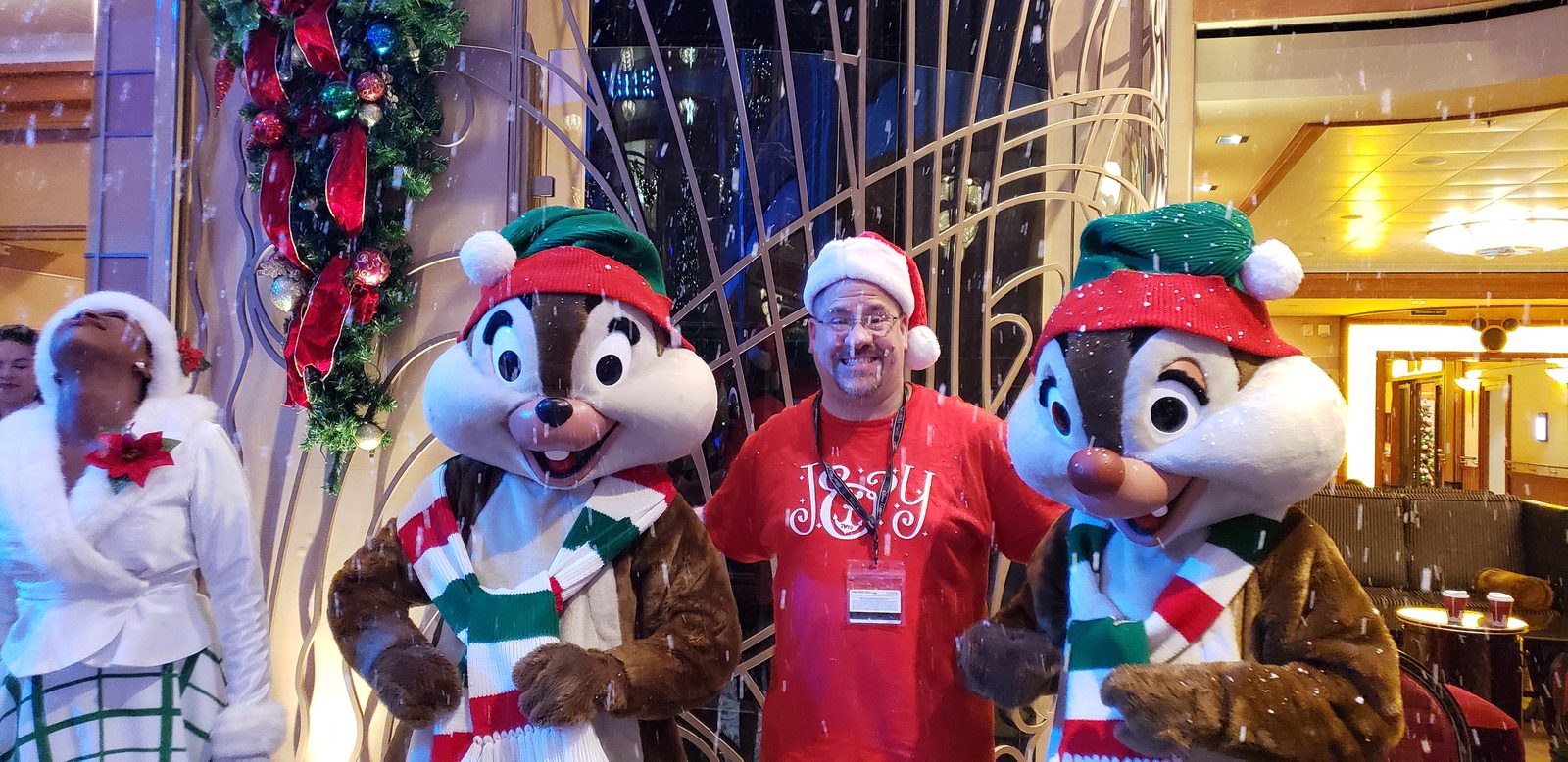 Chip, Michael & Dale in their Christmas scarves and elf hats in the Lobby Atrium