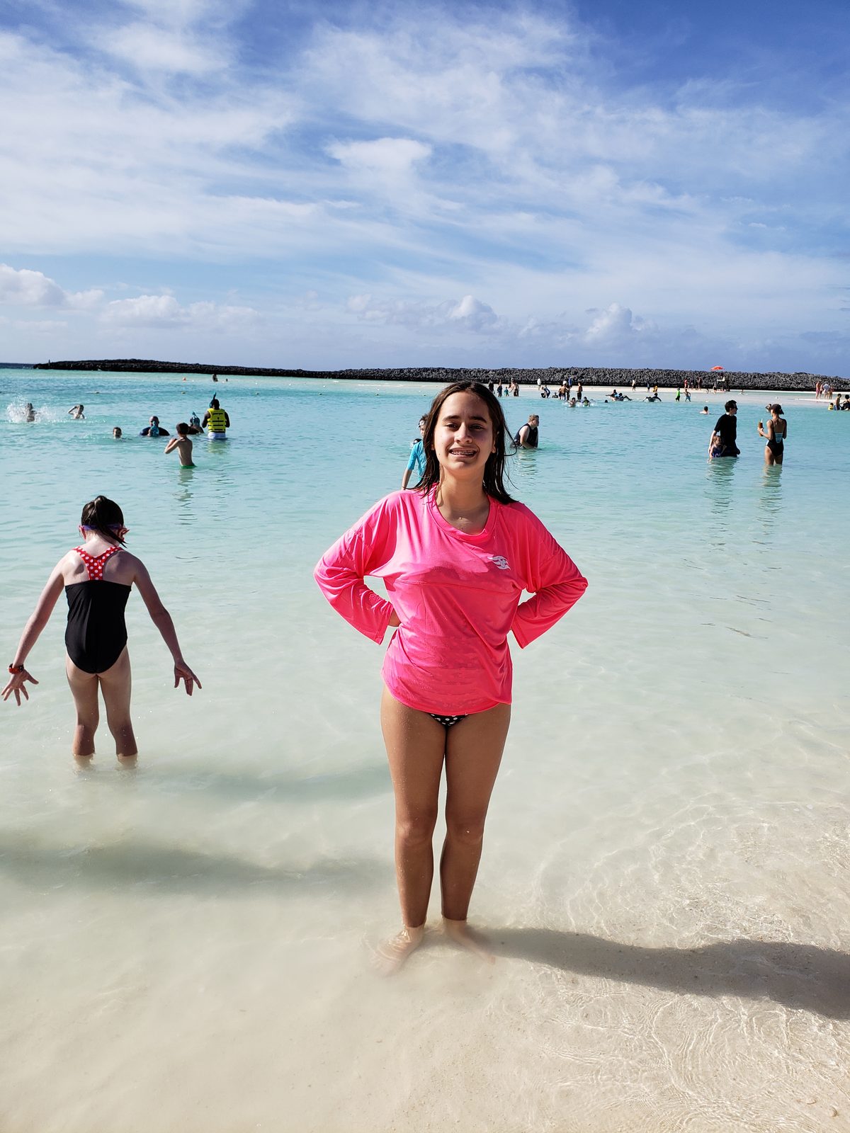 Lisa wading in the shallow water at Castaway Cay