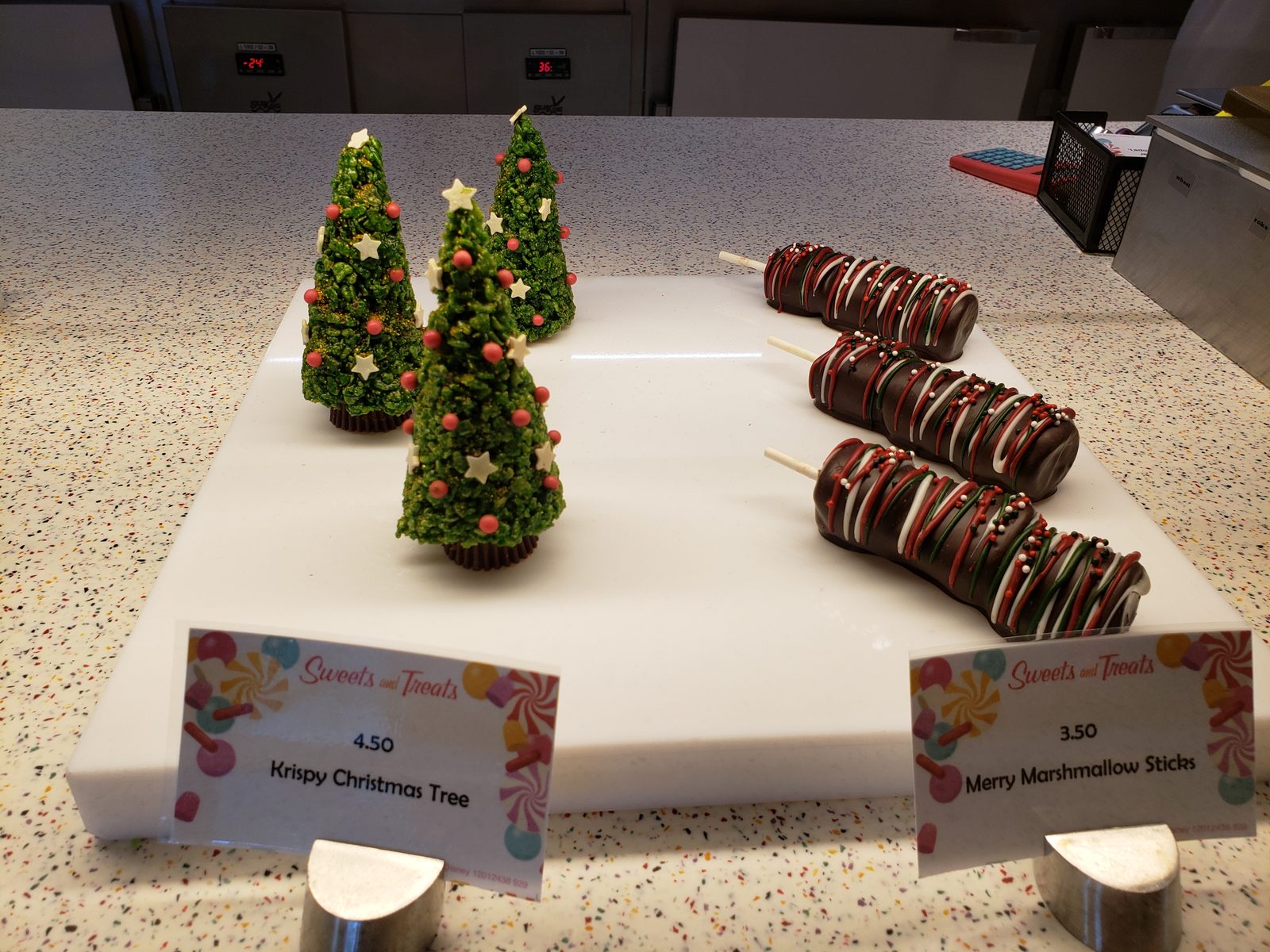 Krispy Christmas trees and marshmallow sticks at Vanellope's