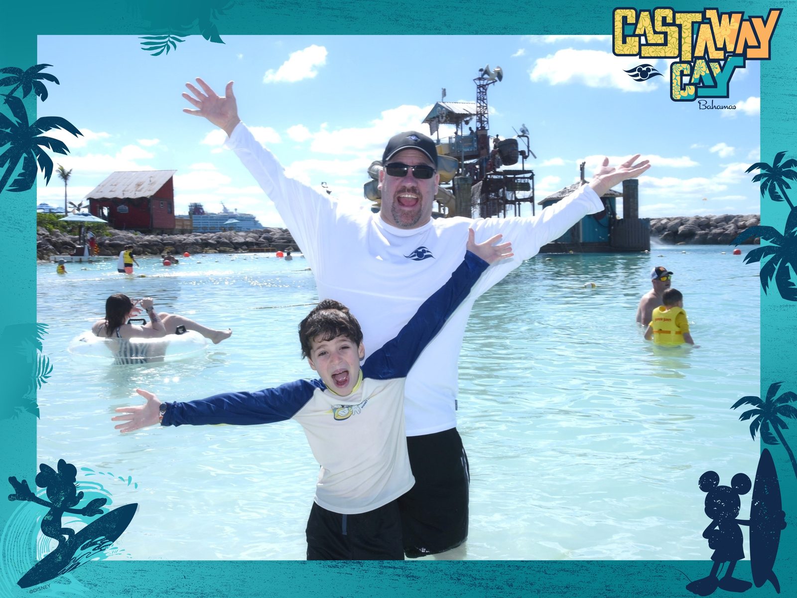 Thomas and Michael in the water at Castaway Cay