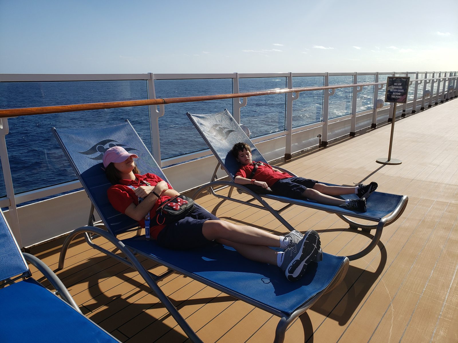 Lisa and Thomas stretched out in deck chairs