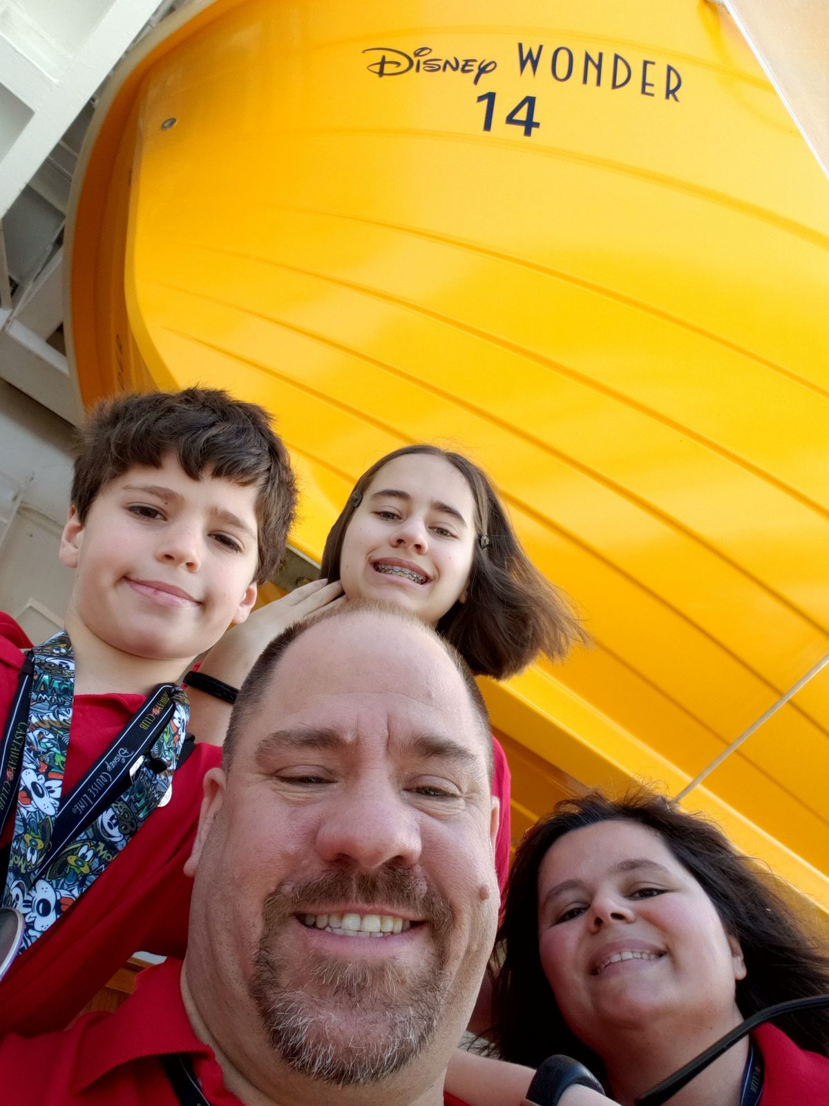 The four of us on the Disney Wonder, our 14th Disney Cruise