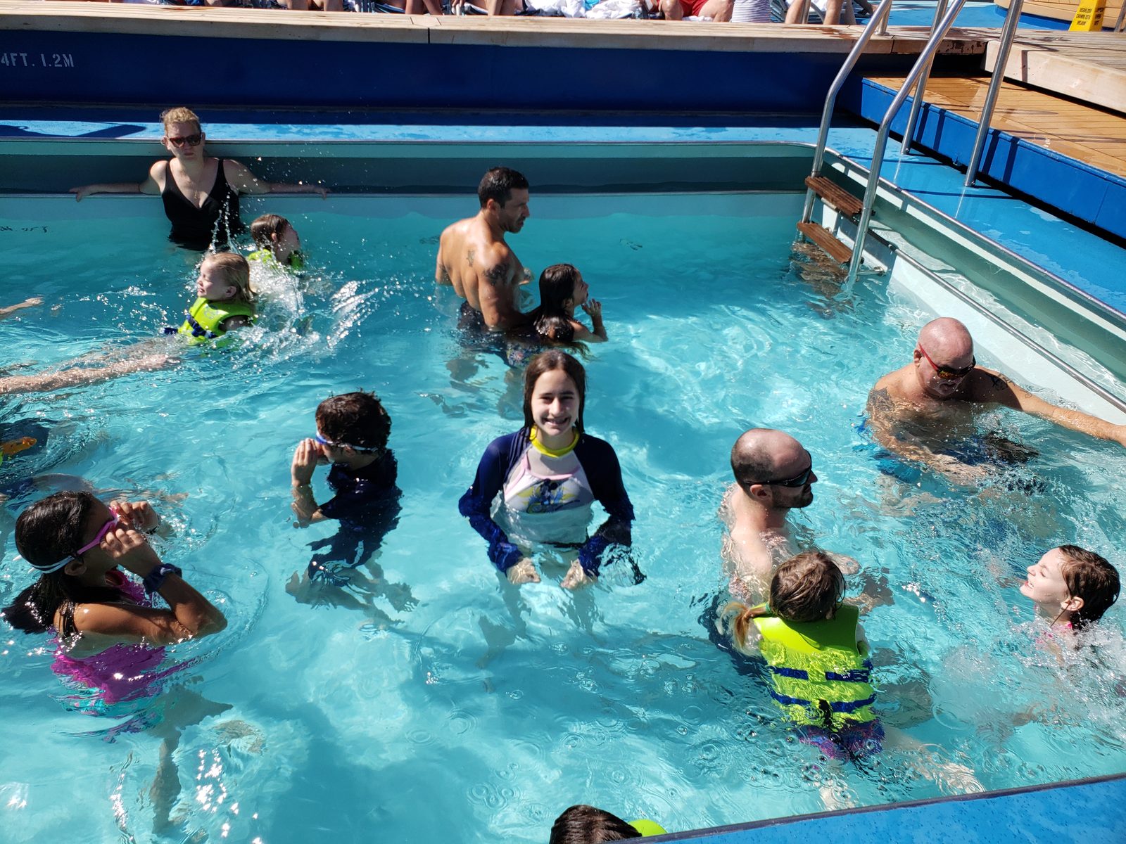 Lisa swimming in the ship's pool