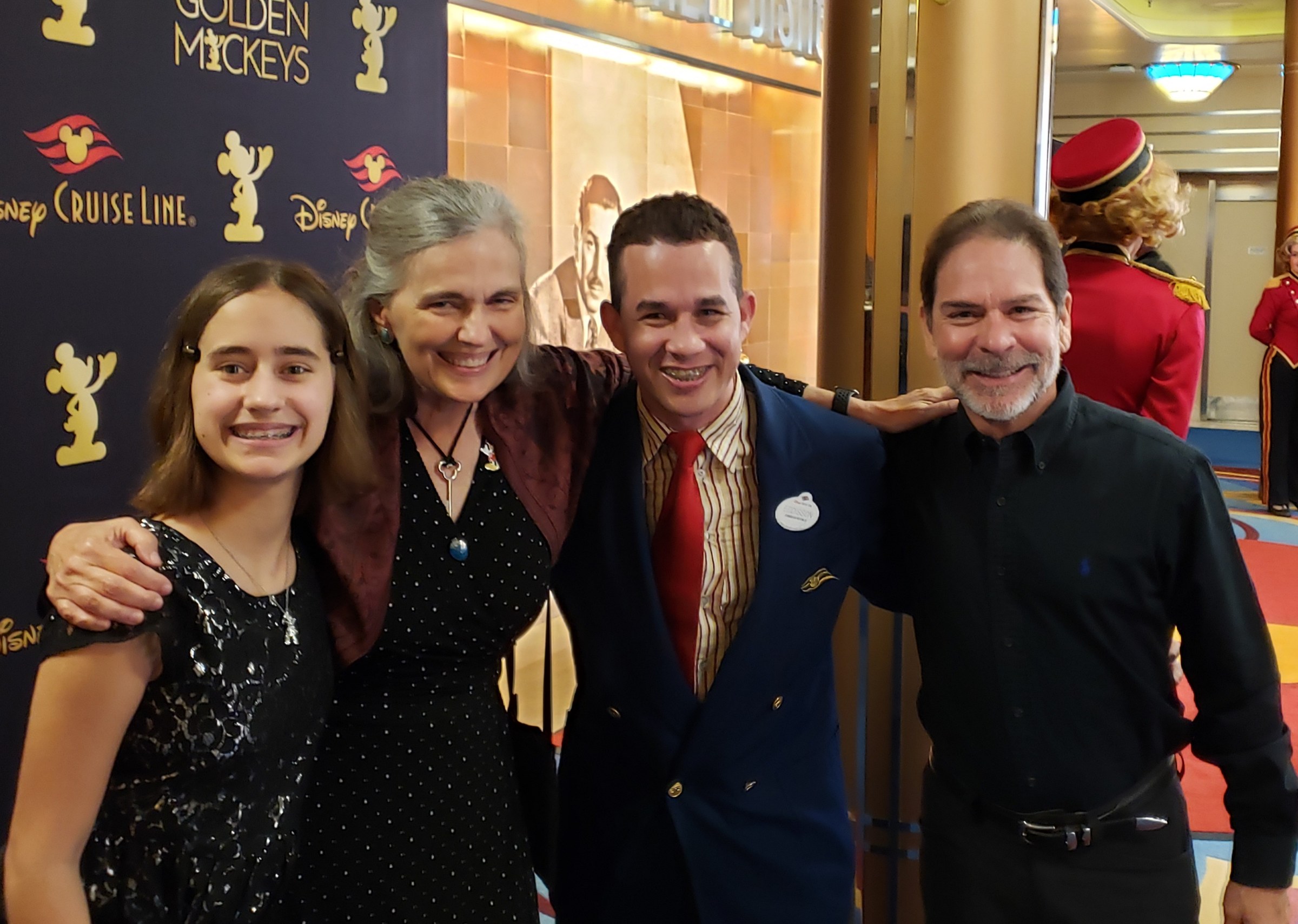 Lisa with LeAnn and Eddisson at the Golden Mickeys backdrop
