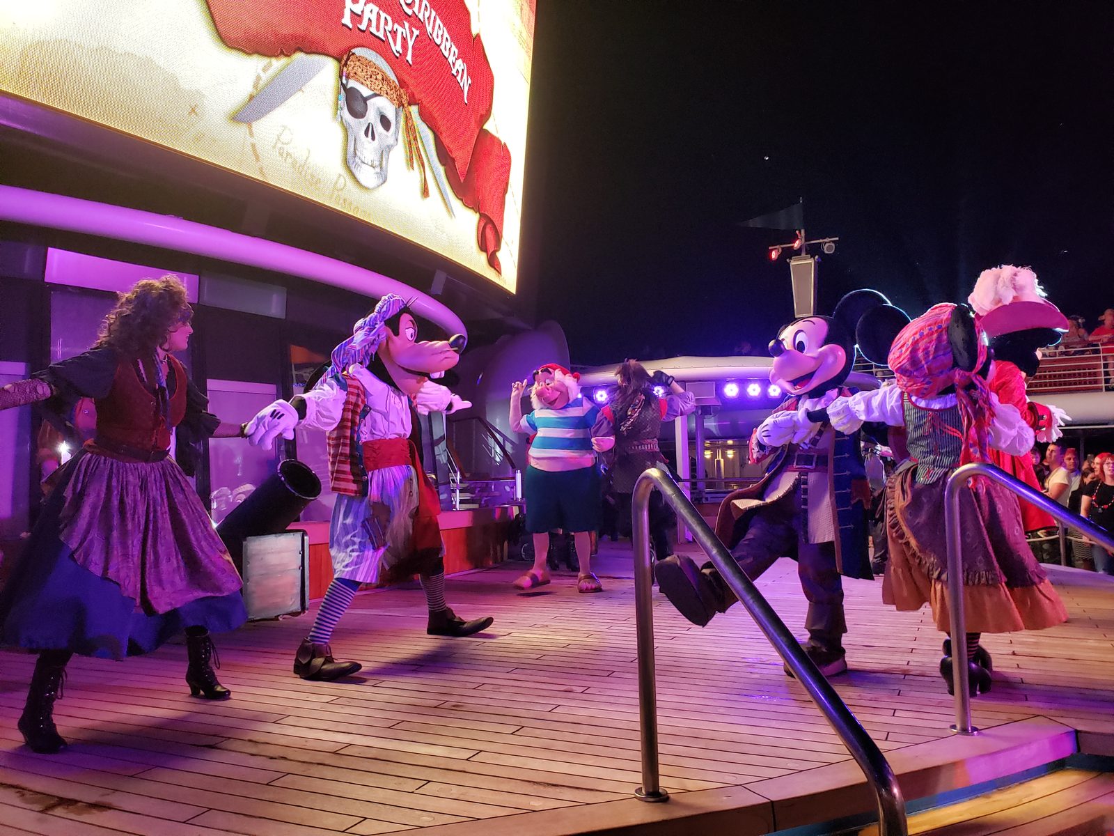 Goofy, Mickey & Minnie in pirate garb with Mr. Smee & Captain Hook at the Pirates in the Caribbean Deck Party