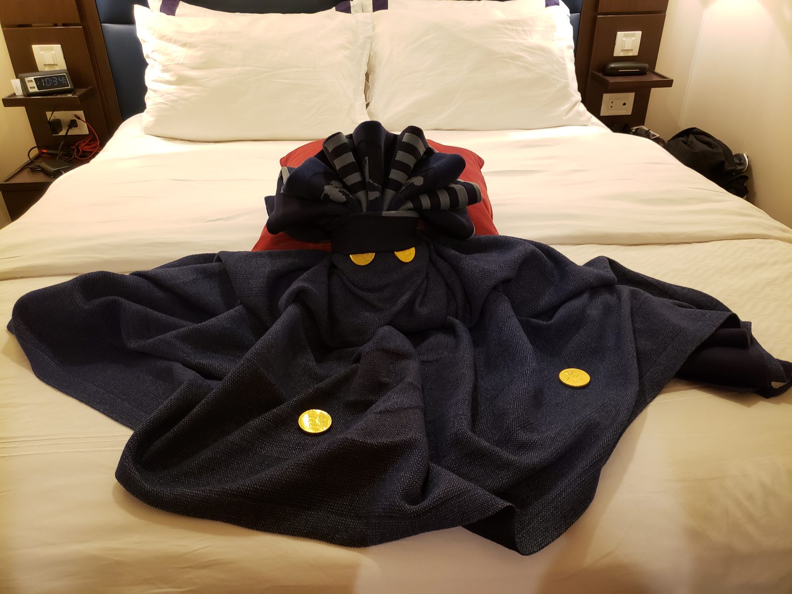 A pirate towel animal waiting on the bed